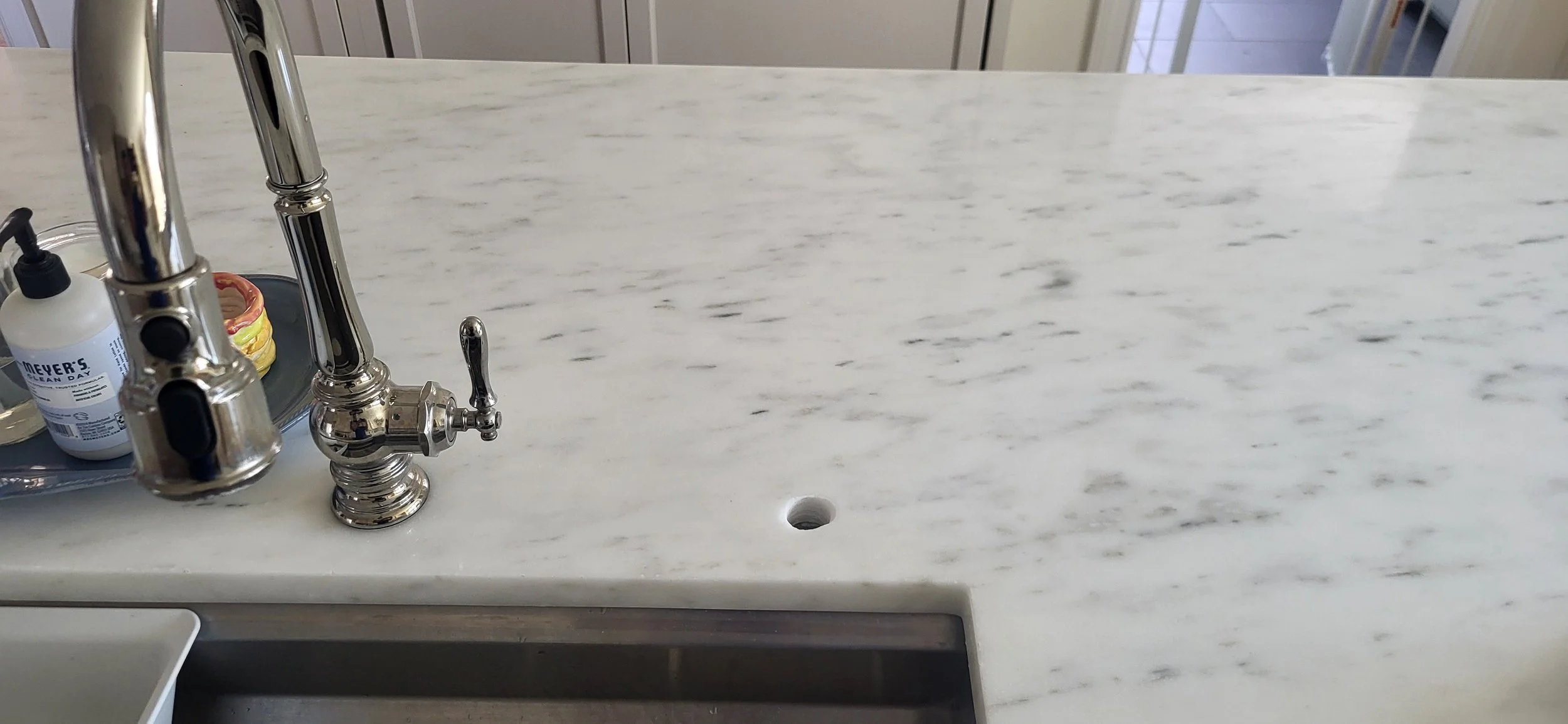 Drilled a additional faucet hole.