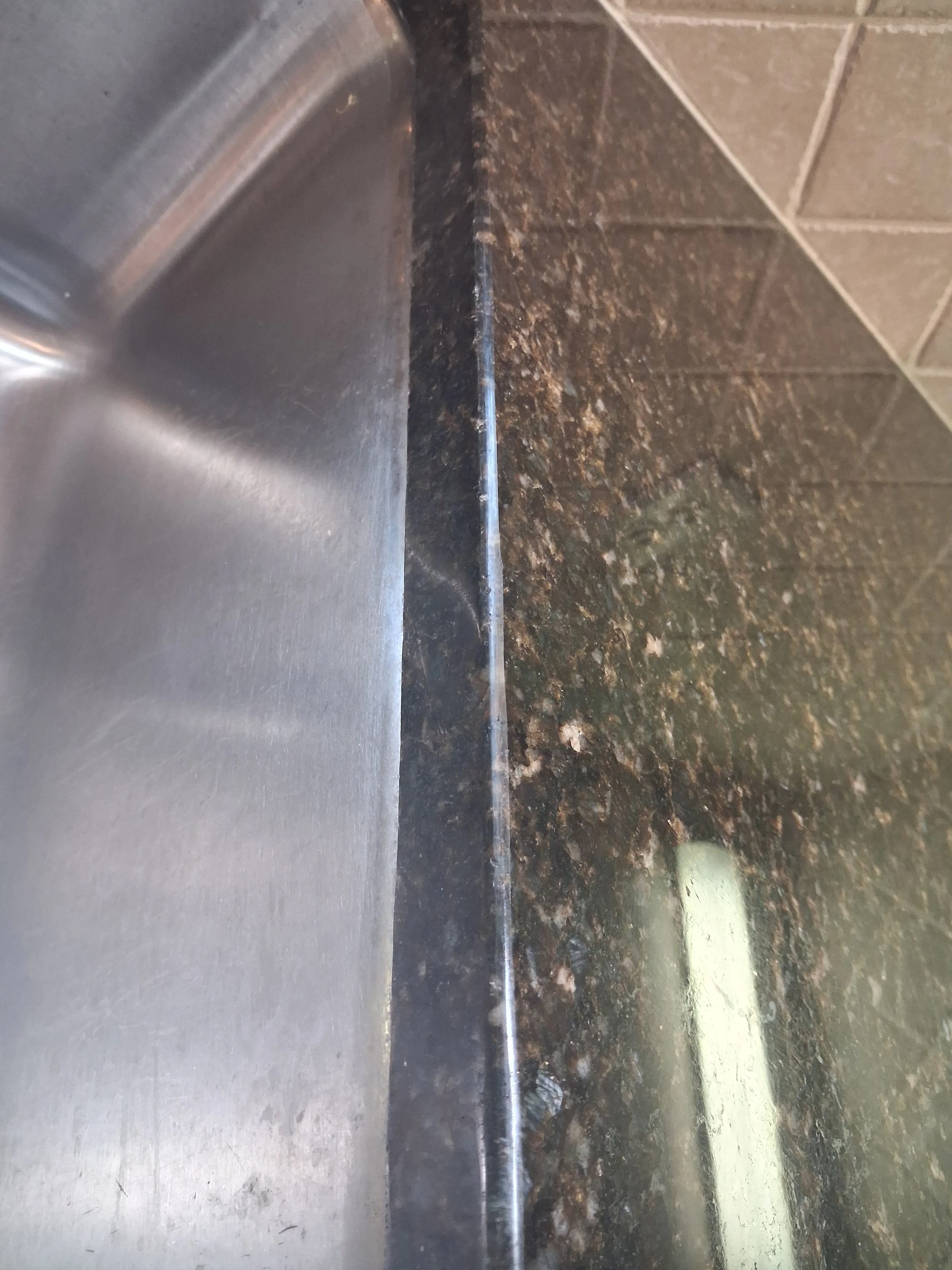 Repaired chips on the rite side of the sink radius repaired.