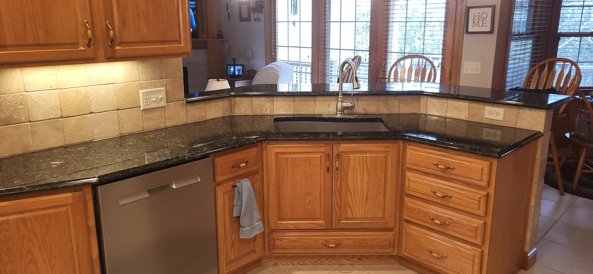 This kitchen sink run and upper bar cleaned and sealed after a big repair.