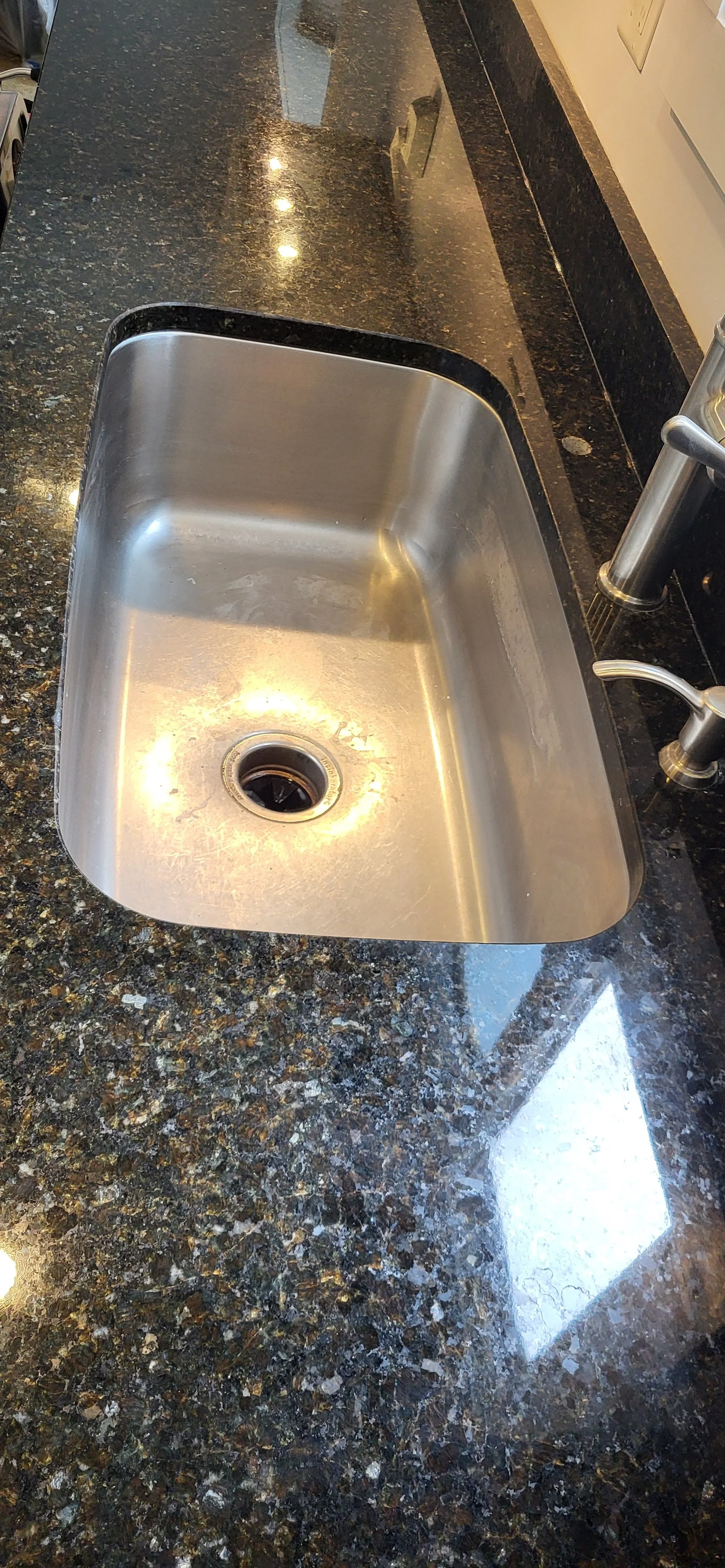 Sink radius completely re-polished all chips repaired.