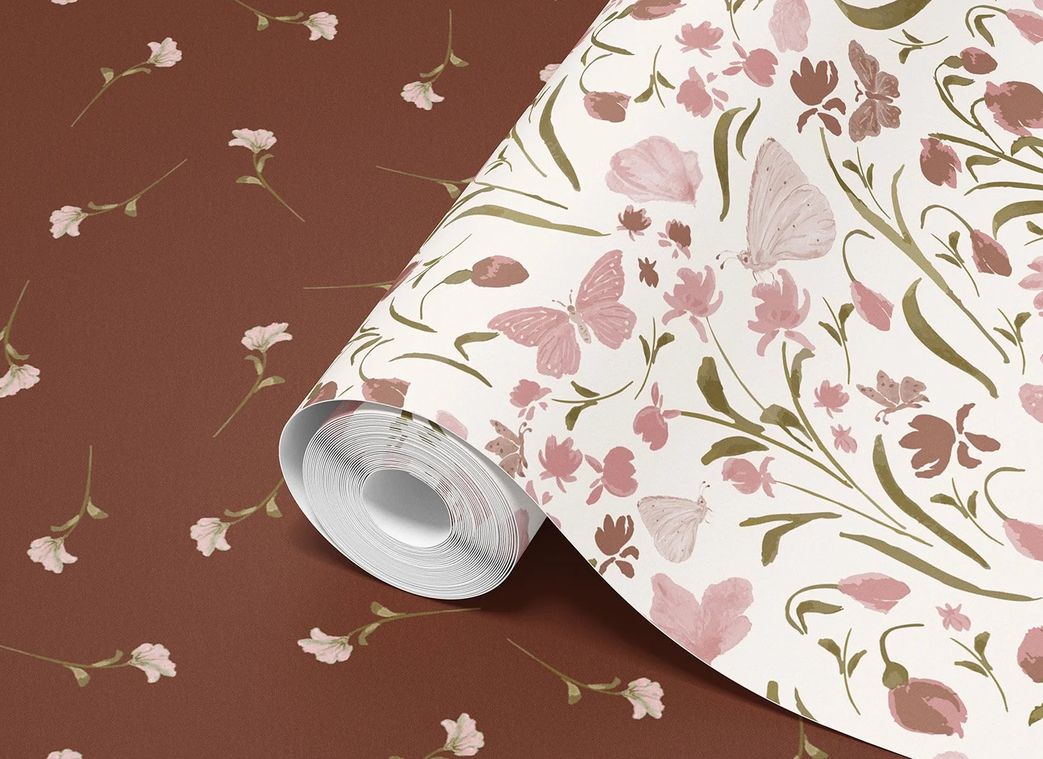 roll of wallpaper with pink toned pattern of flowers and butterflies on dark burgundy patterened background