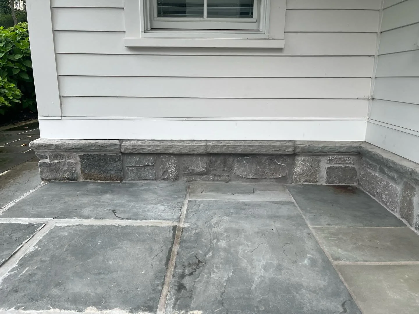 Depending on when a home was built, it can sometimes be challenging to source matching materials for additions or renovations. After a few sample runs, we were able to find a matching limestone and concrete sill to seamlessly connect these two areas 