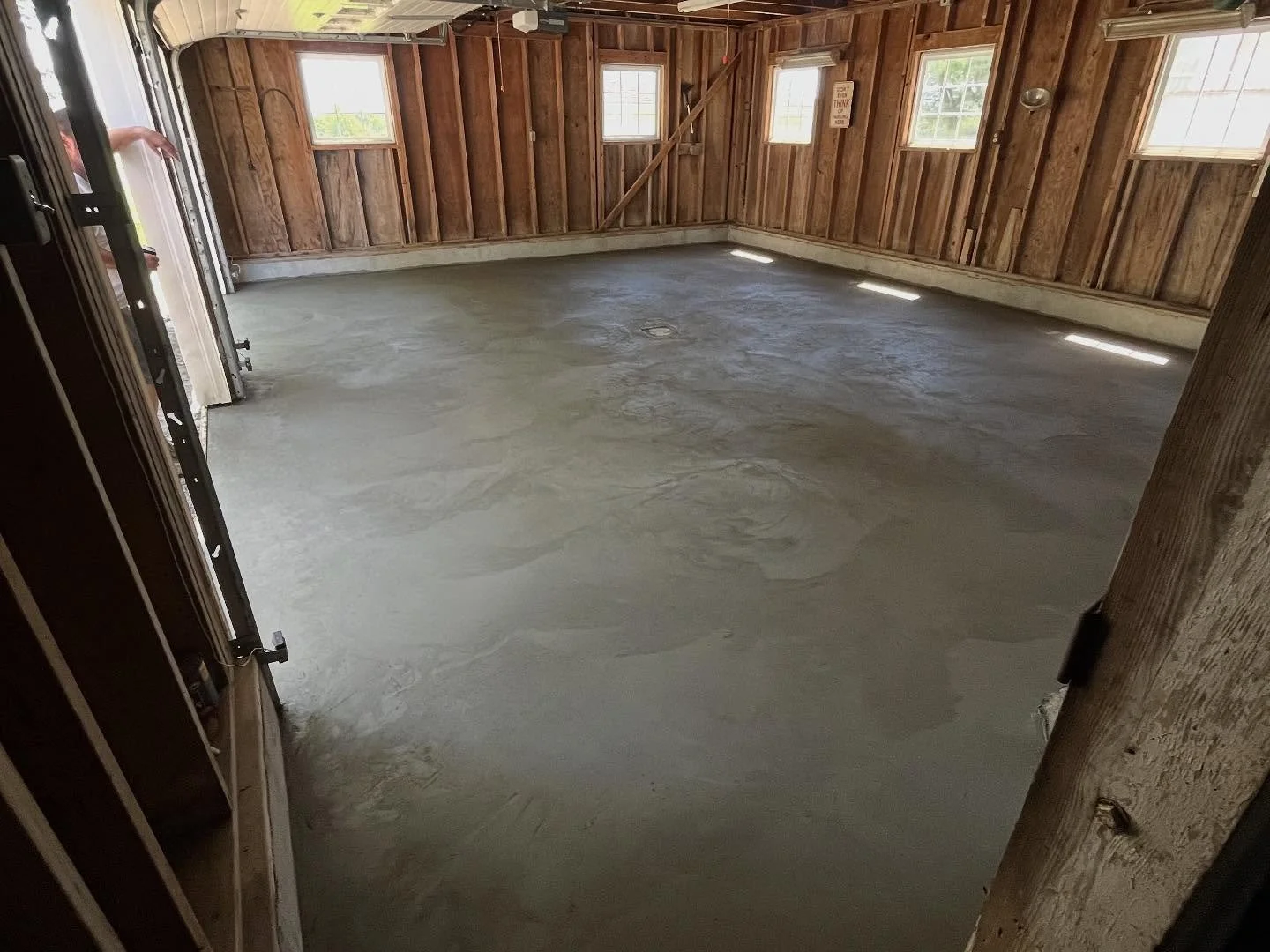 This homeowner contacted us about a garage floor that had sunk over the years, making it difficult to get his car in and out. We demolished the old slab, regraded the base, added reinforcement, installed a new drain, and poured a new floor to fully r