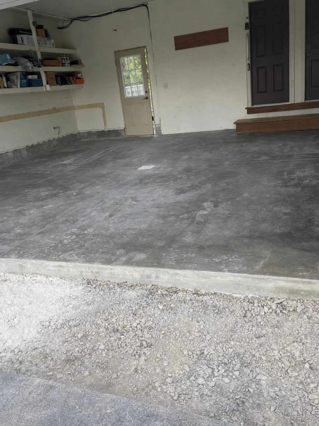 This homeowner&rsquo;s garage floor had cracked and settled more than 2&rdquo; on one side over the past few years. We broke up and removed the old slab using the skid steer (met a few new reptile friends), reinforced the area with steel mesh, pinned