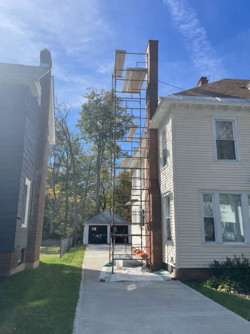 Chimneys, by nature of extending above the roofline, endure some of the harshest weather conditions on a home. A brick chimney is only as strong as the mortar that binds each brick together. In this case, the deterioration had progressed to the point