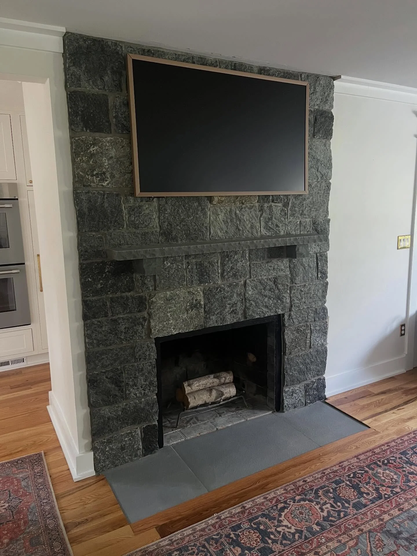 For the finishing touch, we installed @adirondacknaturalstone veneer. Each piece was carefully selected and cut as needed to achieve a balanced, natural layout. The fireplace opening will be finalized at a later date with a wood-burning, glass-view i