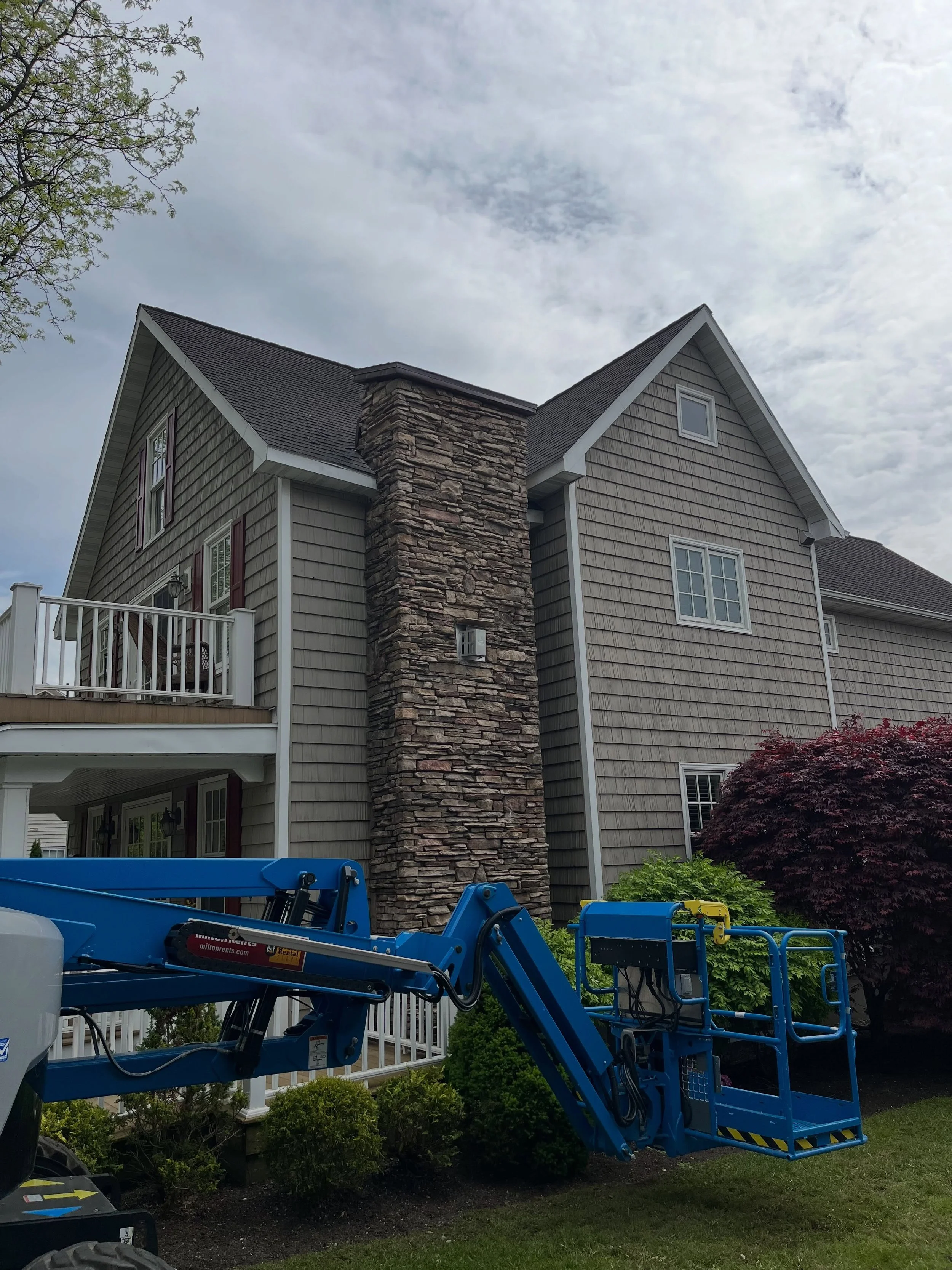 The past two heavy snowfall winters across Central New York have taken a toll on many roofs and chimneys. This business owner reached out in the spring to address a leaning chimney that had become a safety concern. Using a lift, we carefully removed 