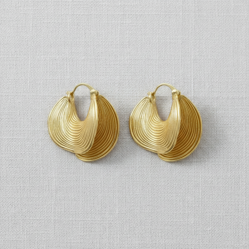 Gold fan earrings.png