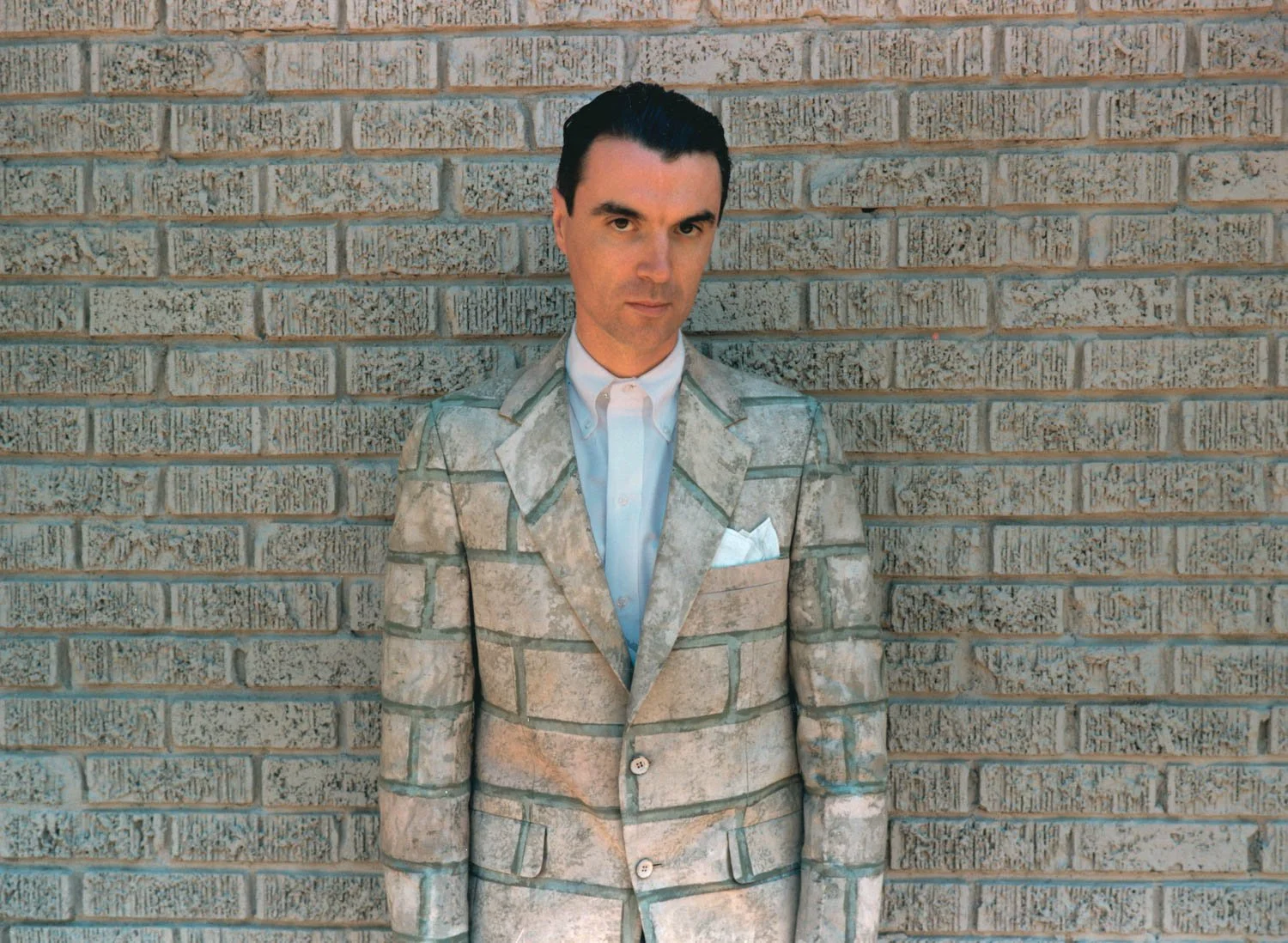 
 David Byrne on movie set of "True Stories," Dallas, TX
