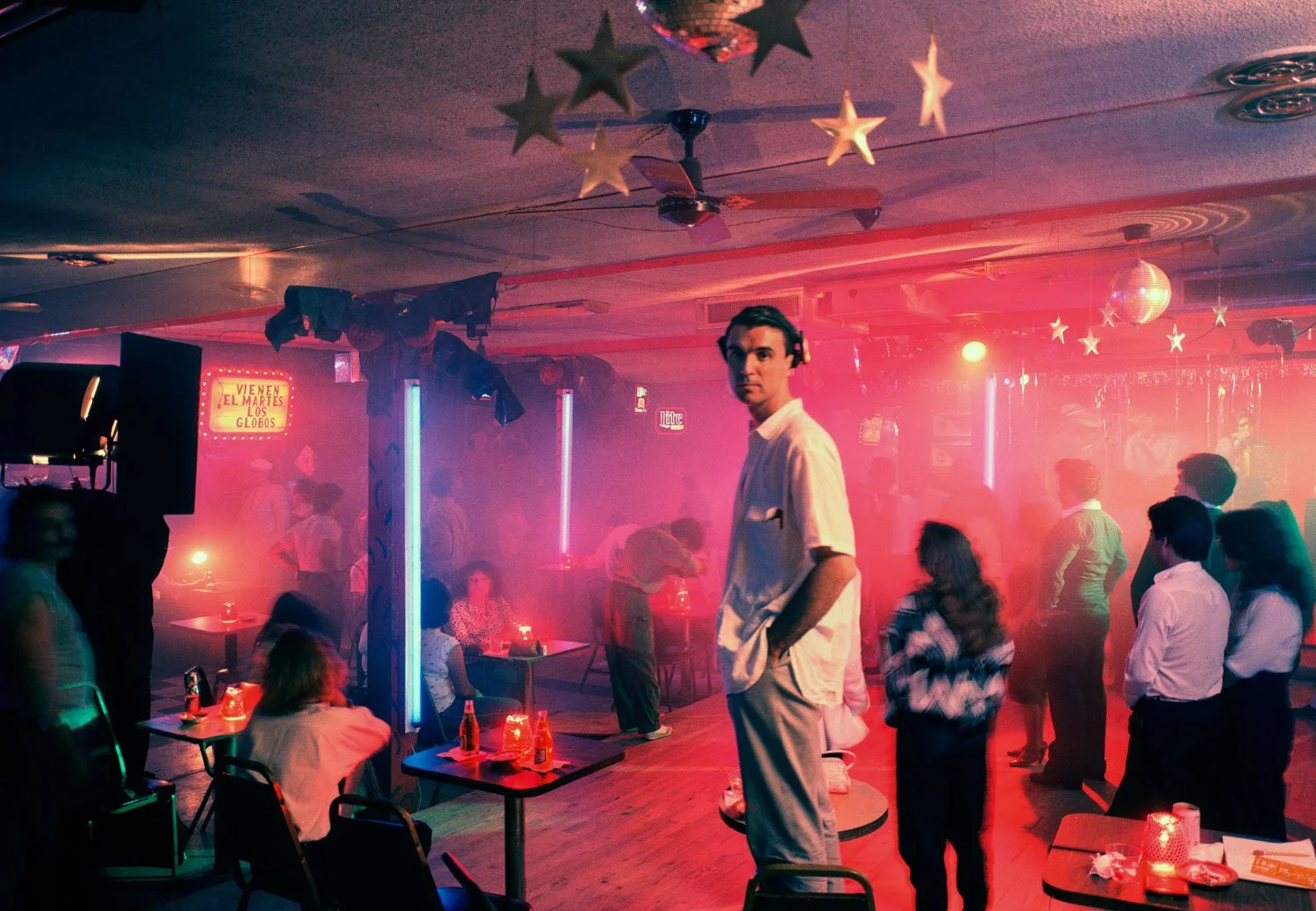 
 David Byrne on movie set of "True Stories," Dallas, TX
