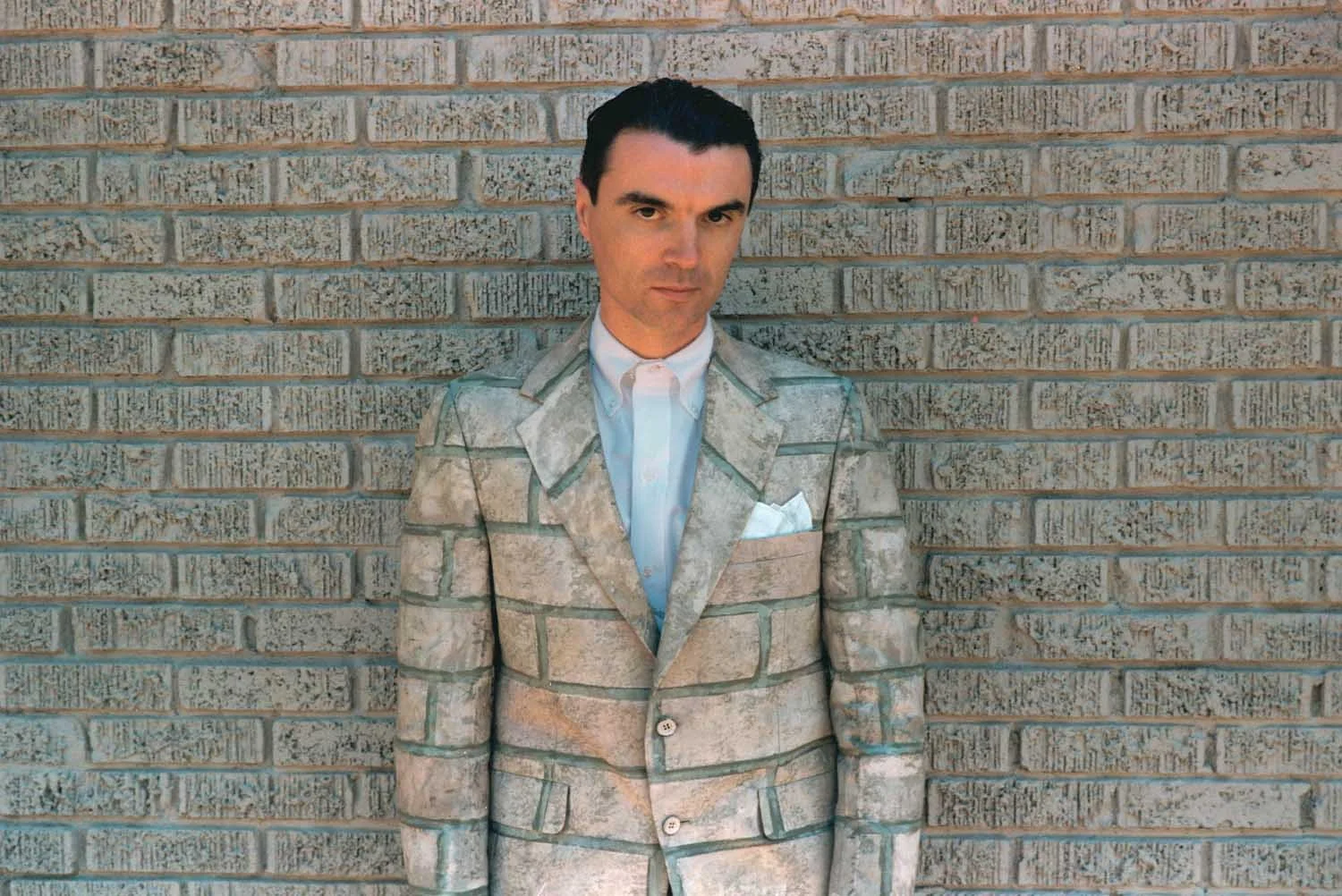 
 David Byrne on movie set of "True Stories," Dallas, TX
