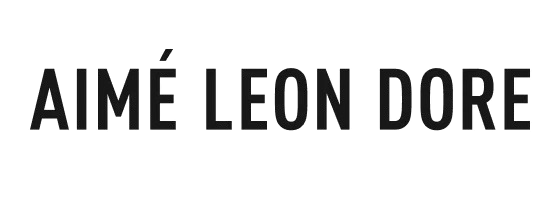 Text that says "Aimé Leon Dore" on a black background.