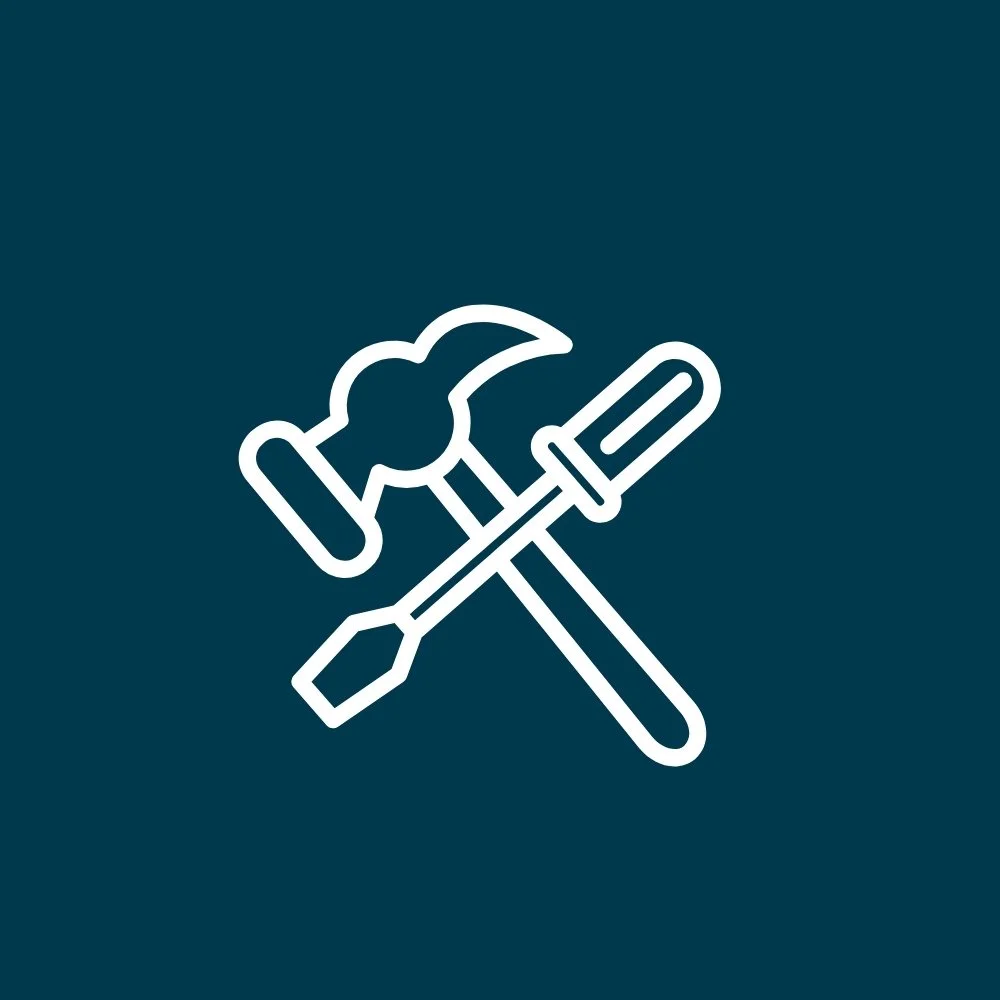 Line drawing of a hammer, screwdriver, and wrench crossing each other