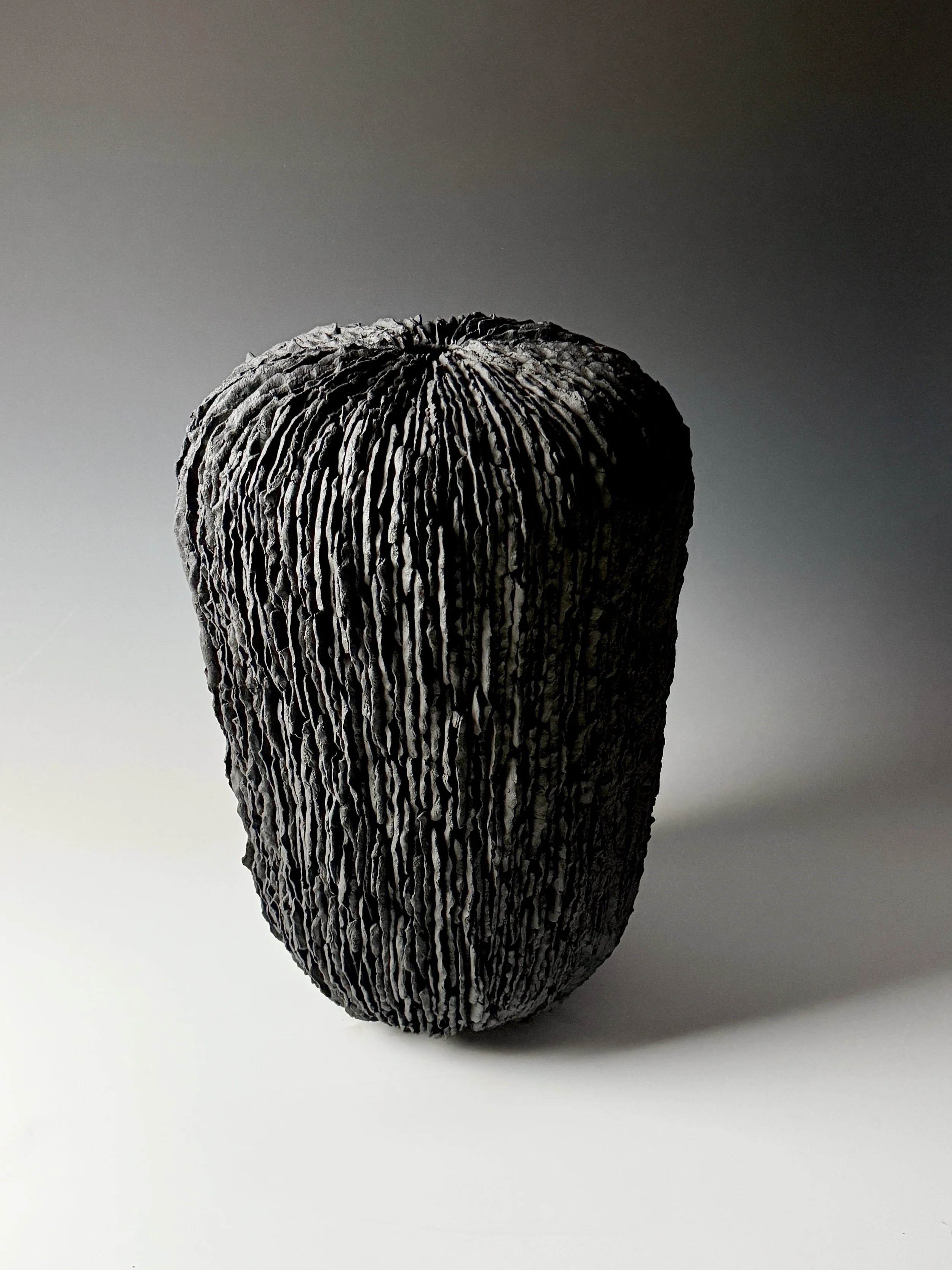 axis mundi | sold | Stoneware, 2025 | 20"H x 12"W | Permanent Collection of Denver Art Museum