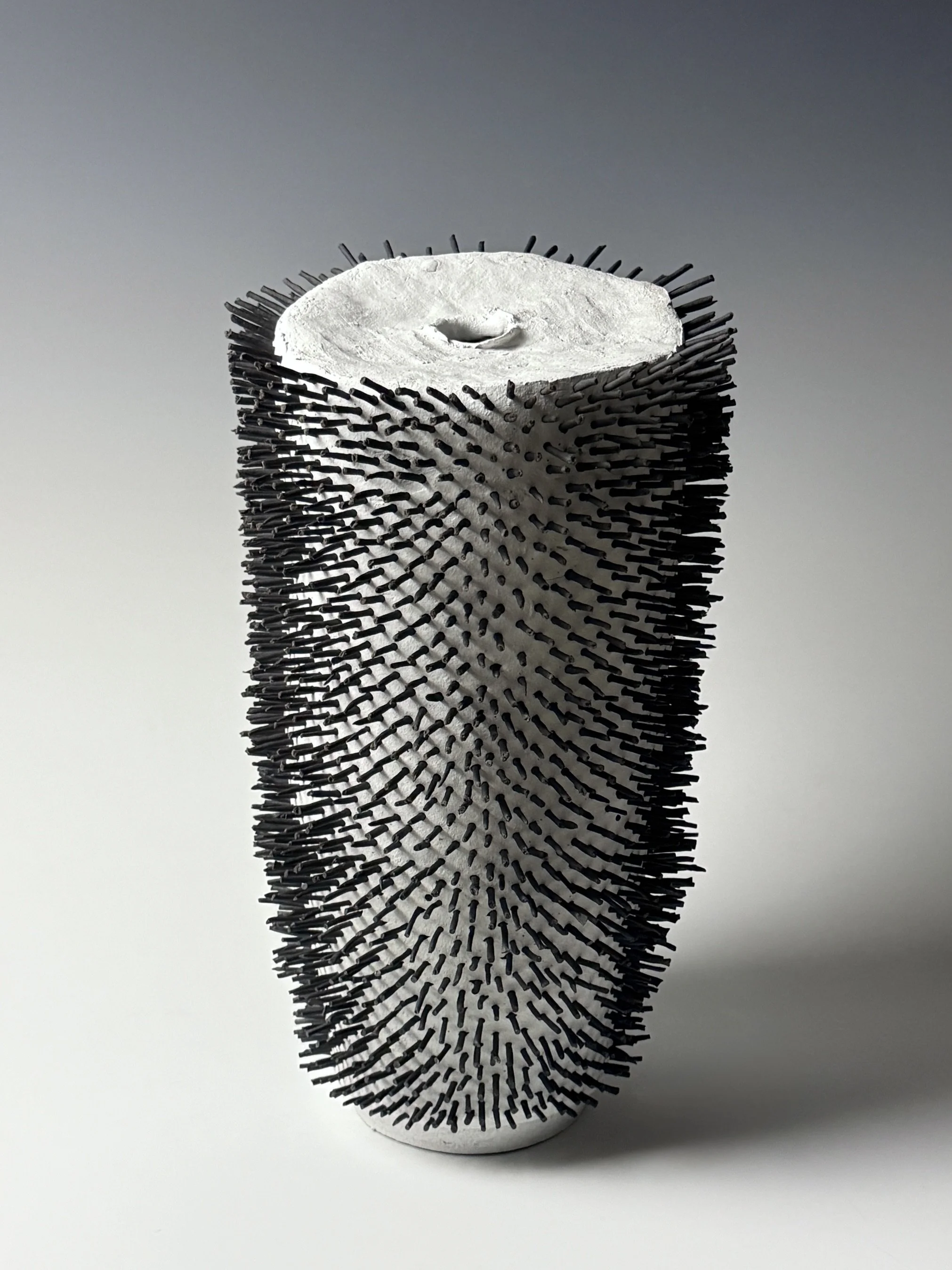 Sebastian (black needles) | sold | Stoneware, 2026 | 14"H x 8.5"W