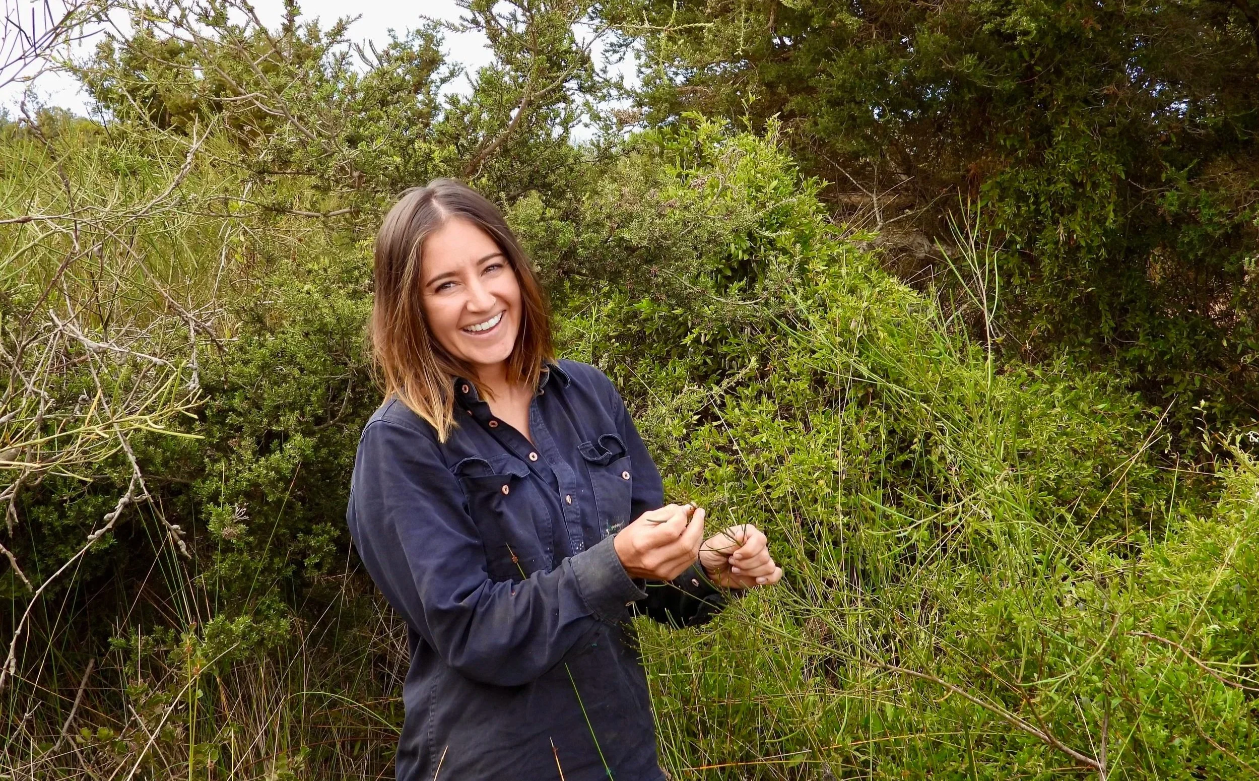 Image of Yarnin Seeds consultant, Laura Wishart in the bush, on-Country (Western Australia).