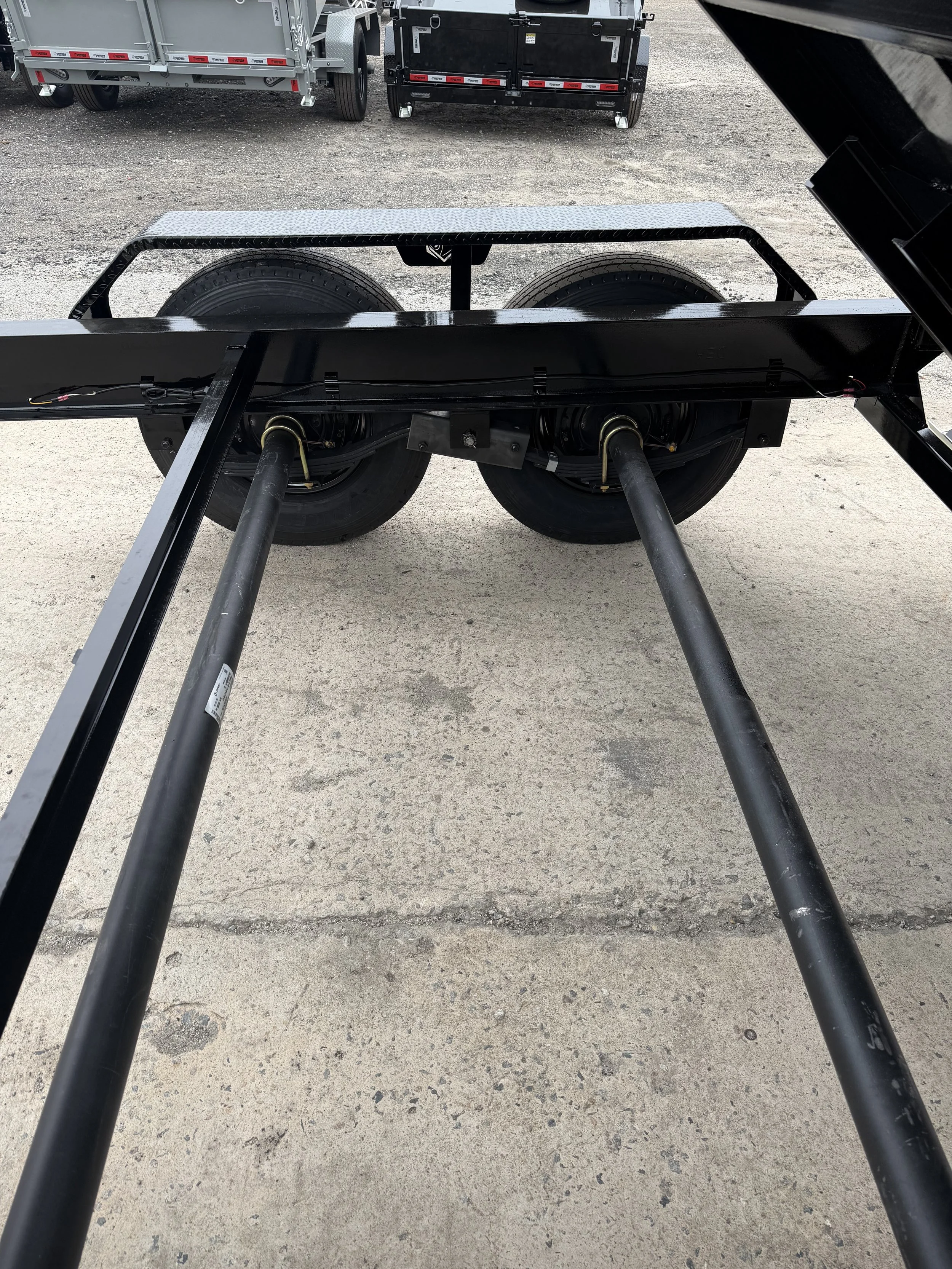 Heavy-duty dump trailer axles and suspension system