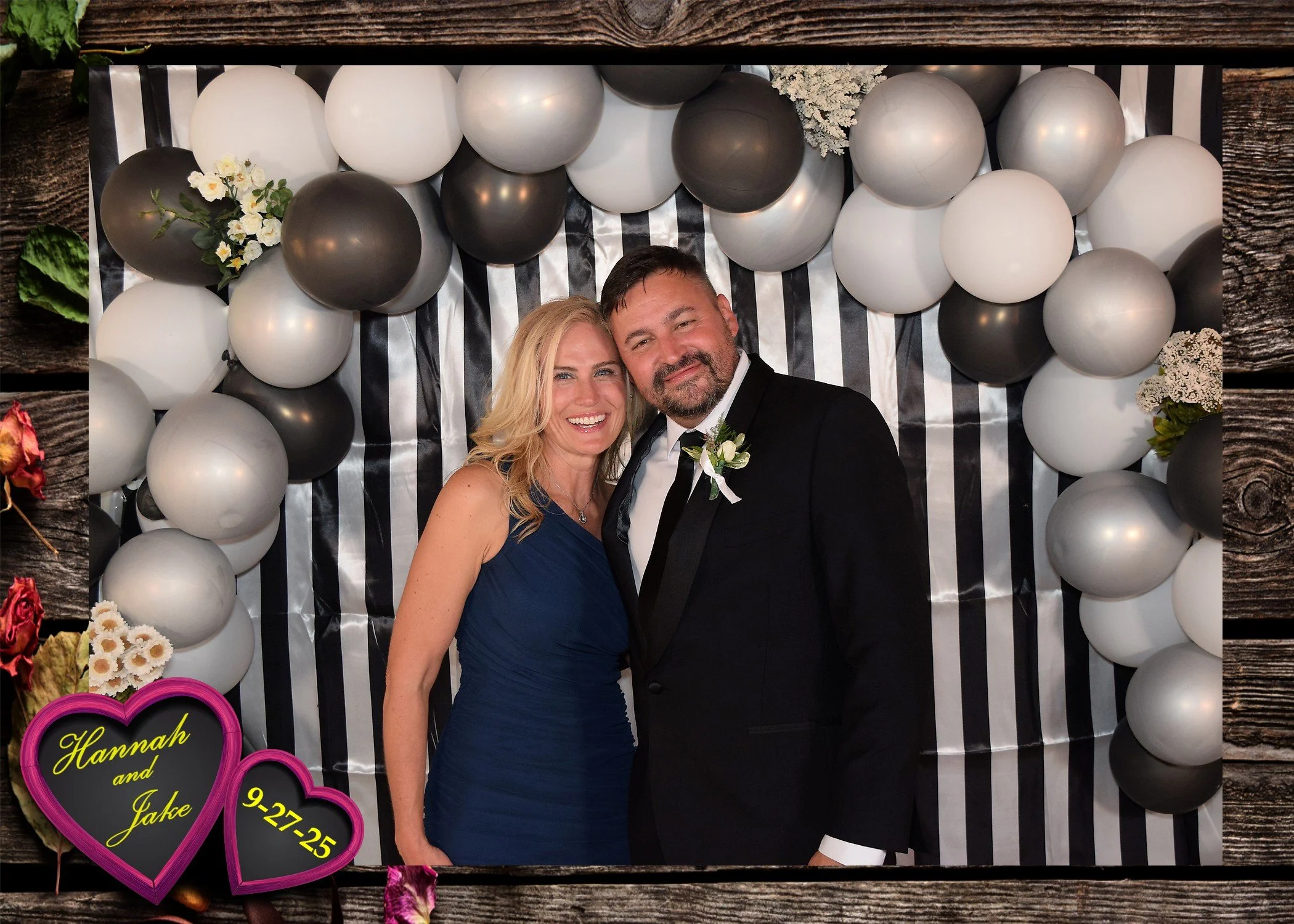People in front of a photobooth backdrop.