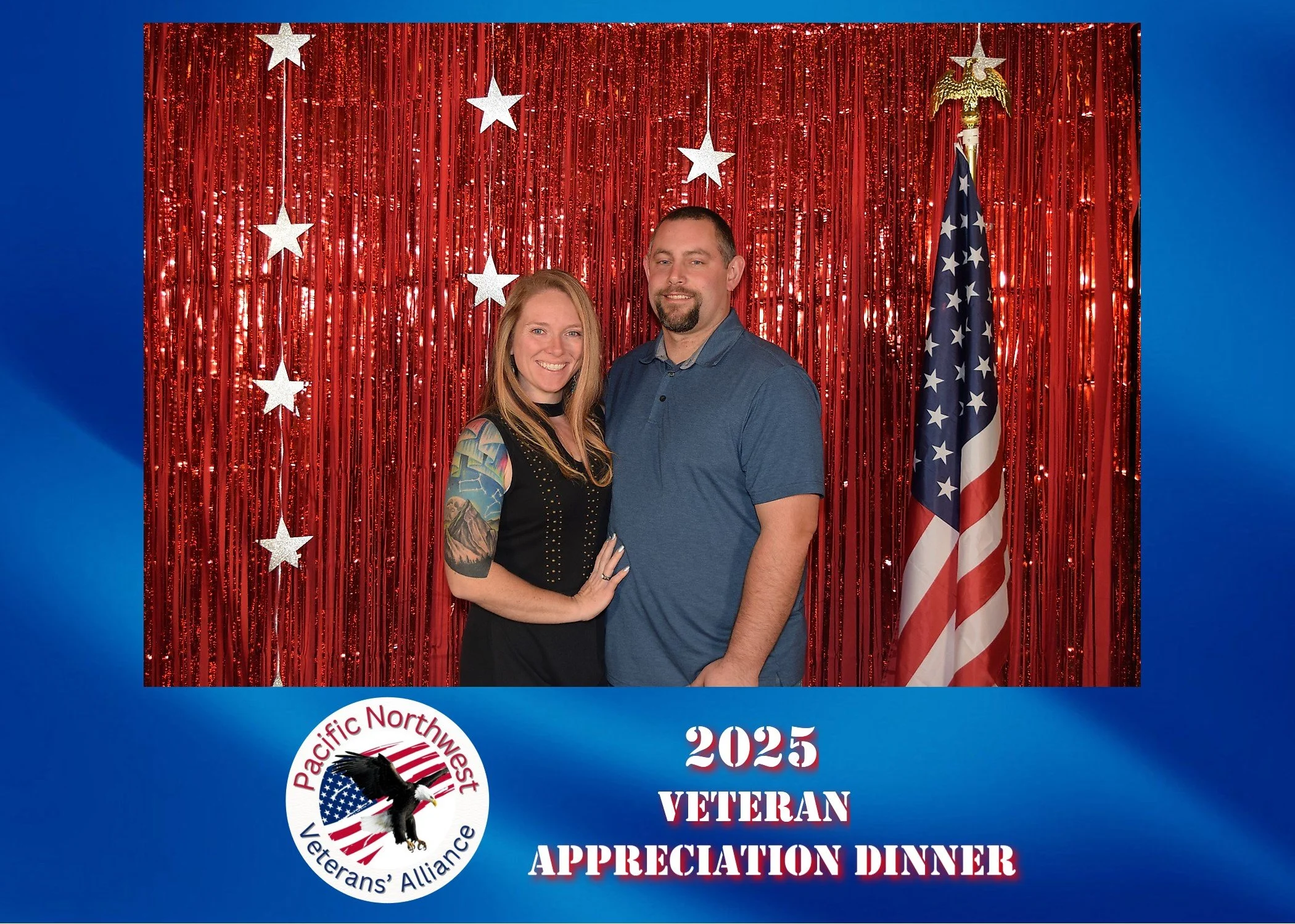 People in front of a photobooth backdrop.