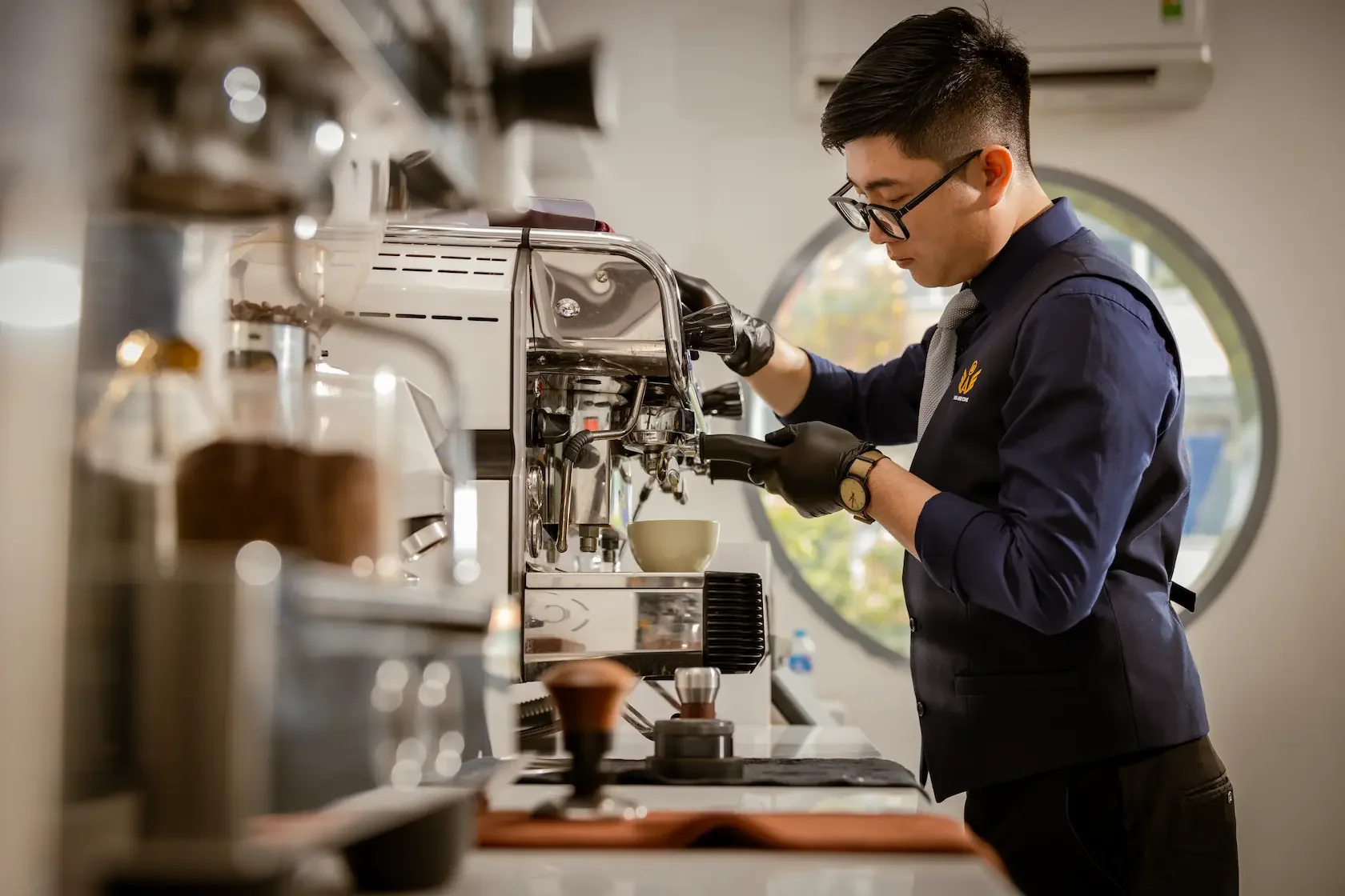 Barista instructor making an espresso