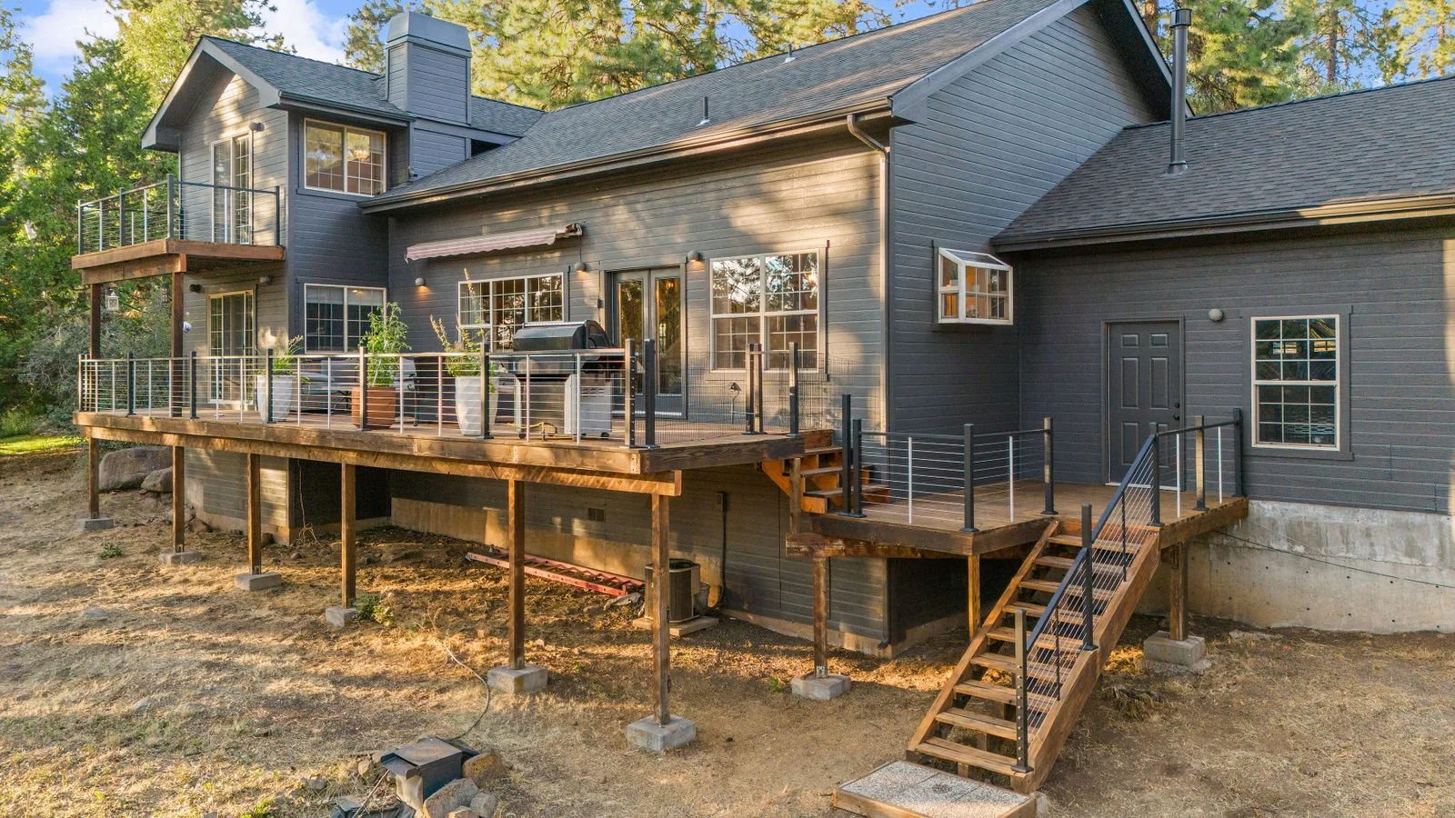 Professional real estate photography- Exterior of back deck and outdoor space. 