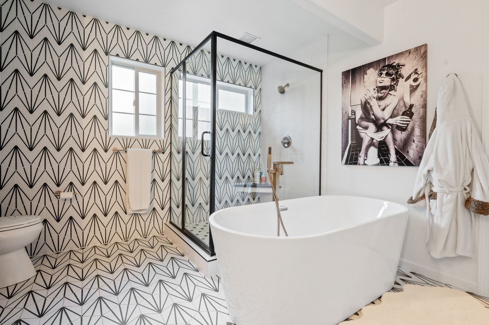 Professional real estate photography-Bathroom with modern tile and soaking tub.
