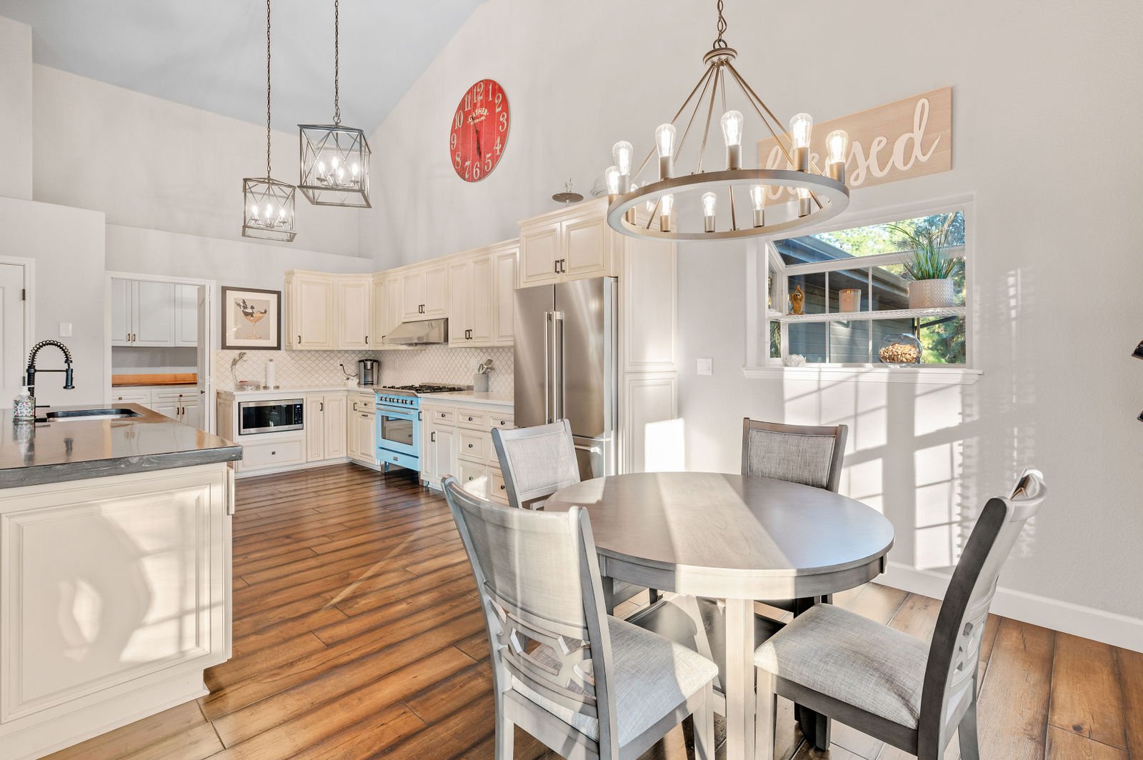 Professional real estate photography-Dining room and kitchen entrance. 