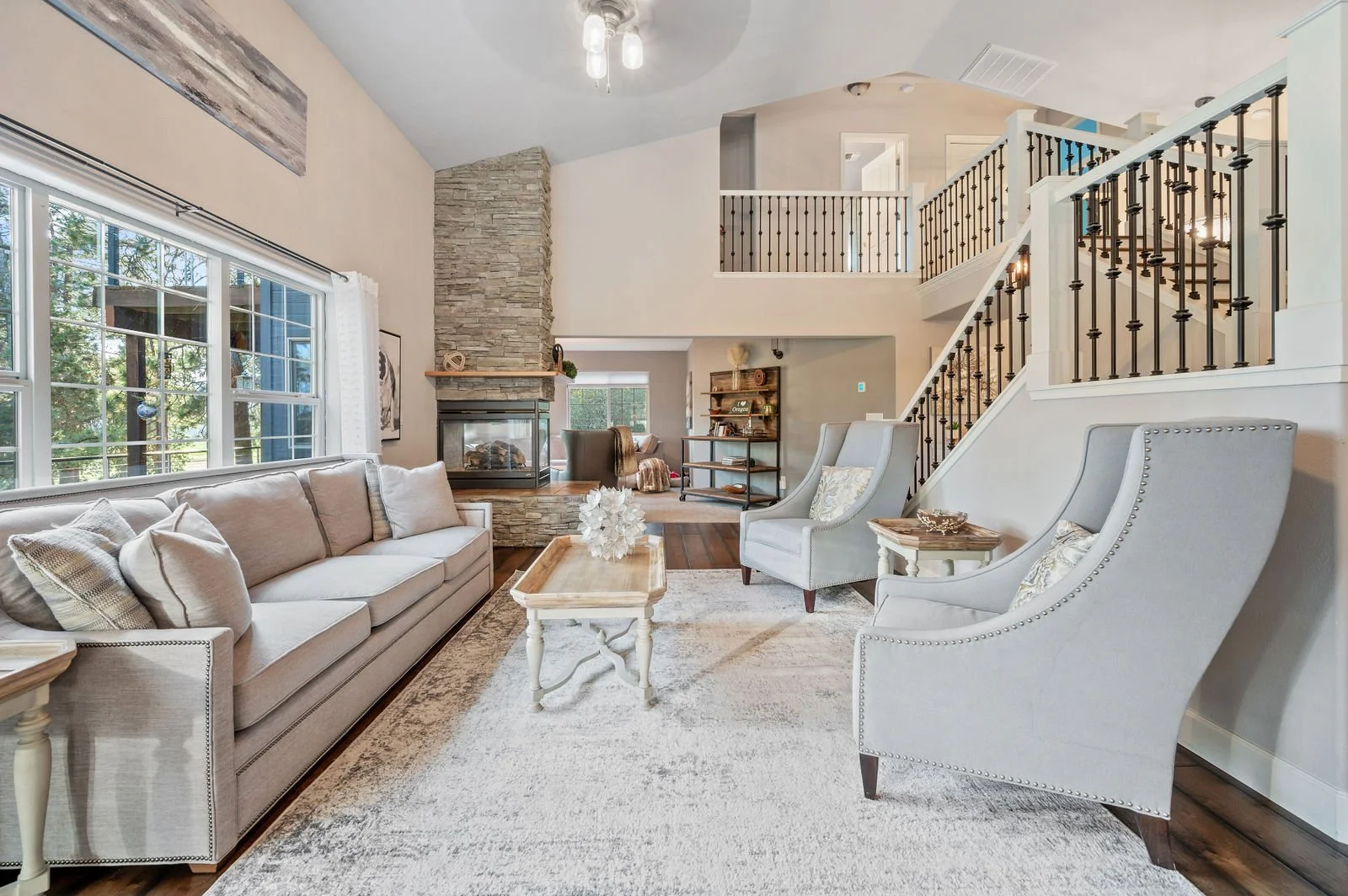 Professional real estate photography- Front living room and stairway.