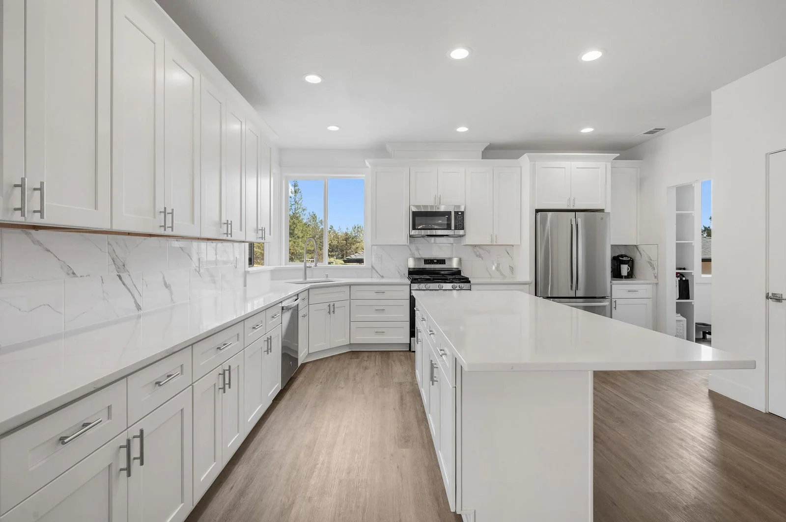 Professional real estate photography and drone imagery- Straight on shot of kitchen prep space. 