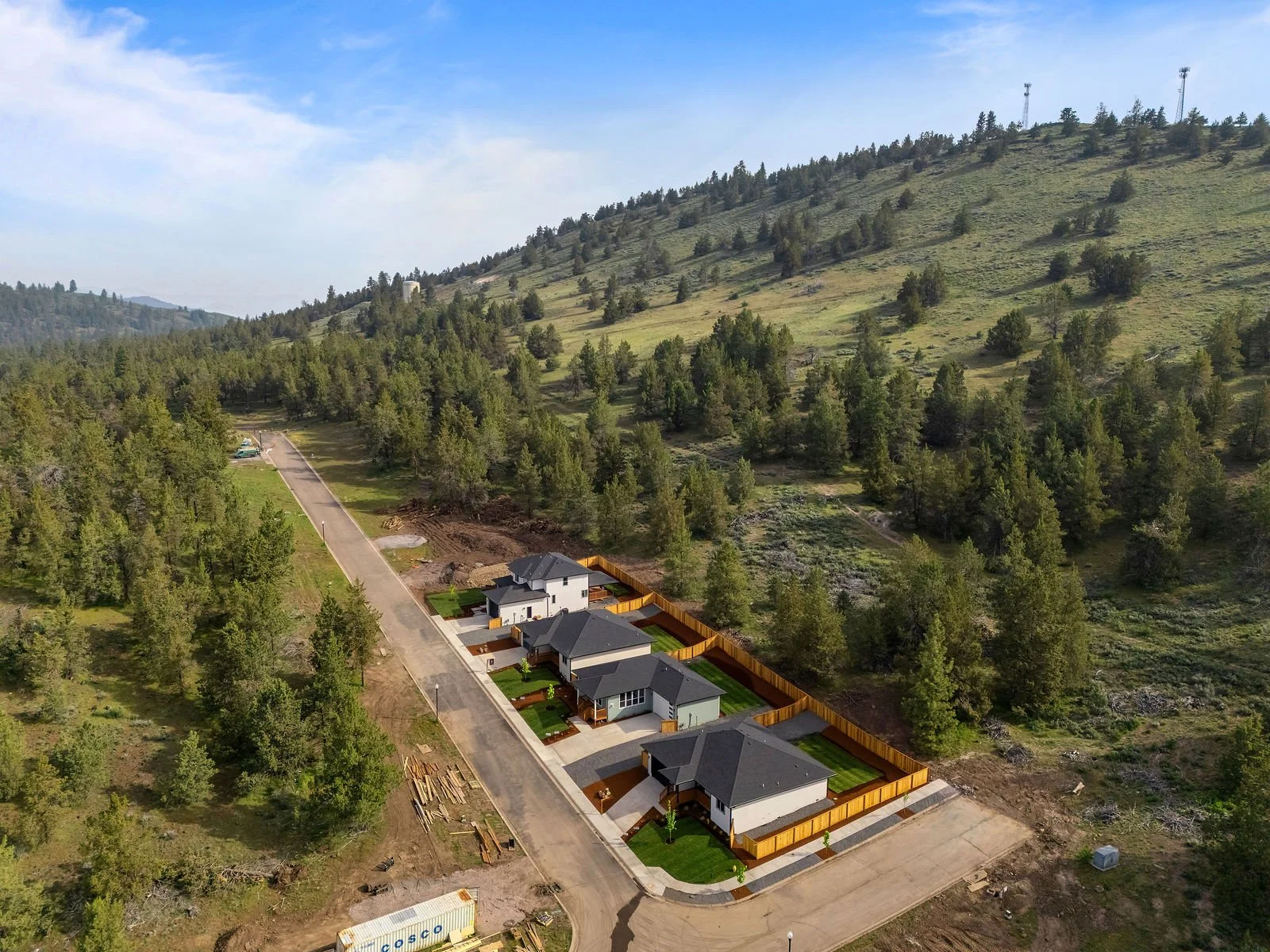 Professional real estate photography and drone imagery- Drone image of four newly constructed home for sale in Klamath Falls. 