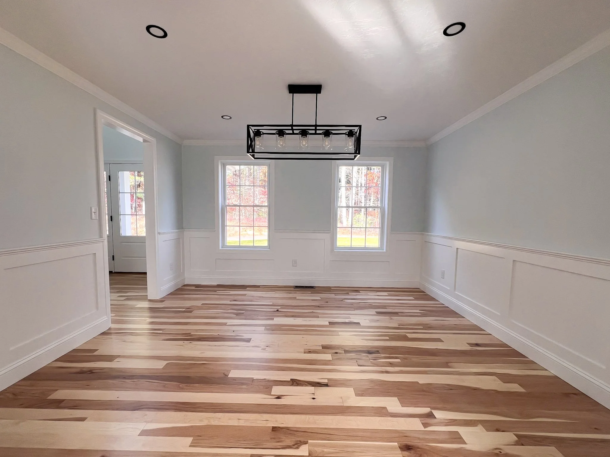 Interior trim and wainscoting installation by Reimagined Joinery