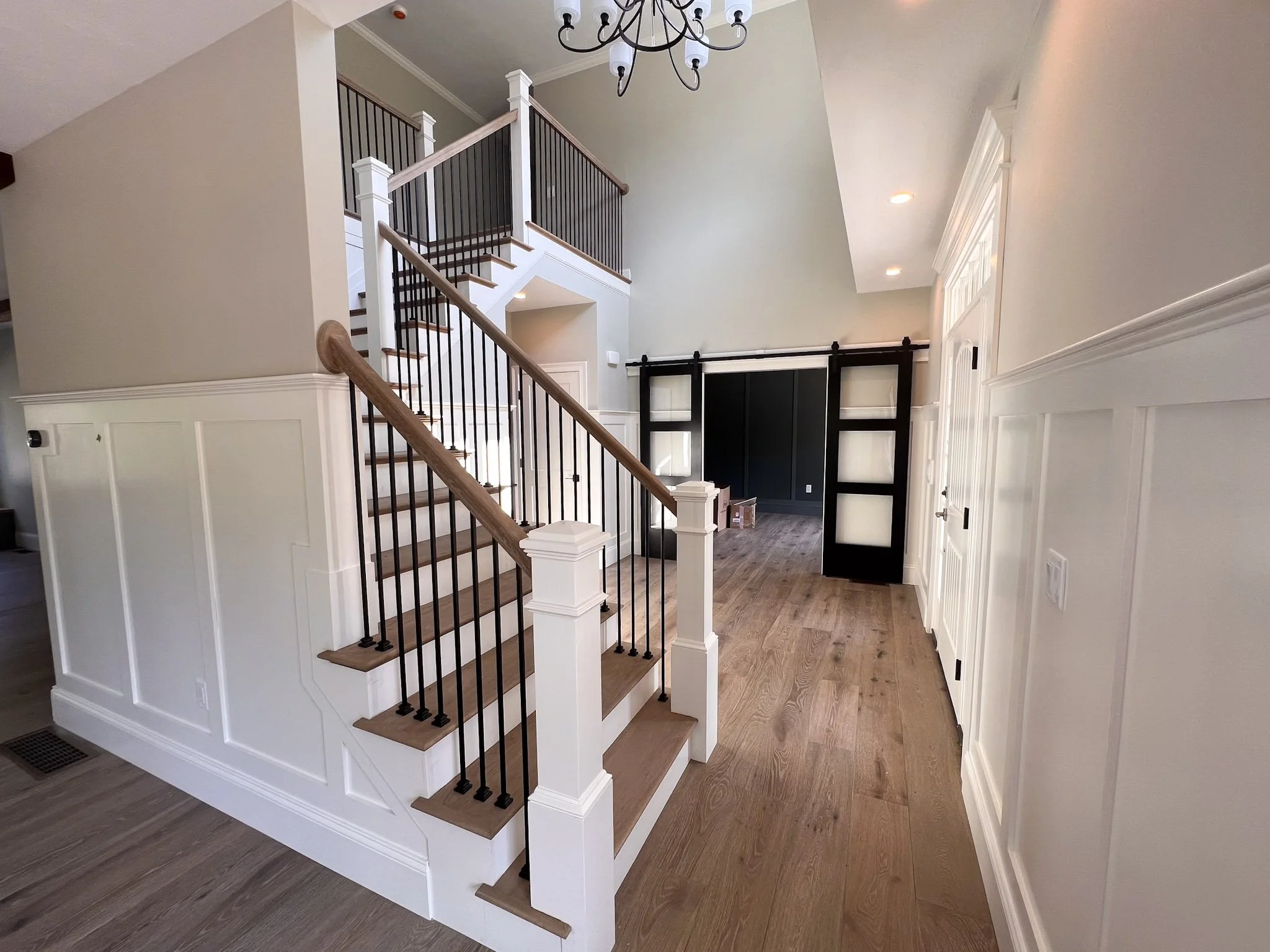 Interior staircase and railing installation by Reimagined Joinery.