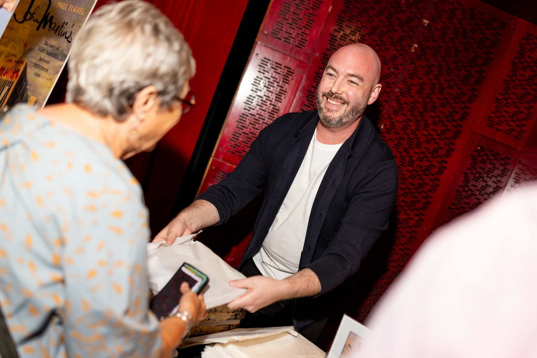 Paul selling his beloved 'John Martin's' Book