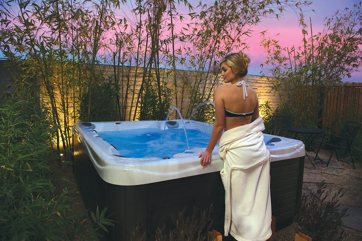 Hot+Tub+in+Backyard+at+sunset+CC.webp