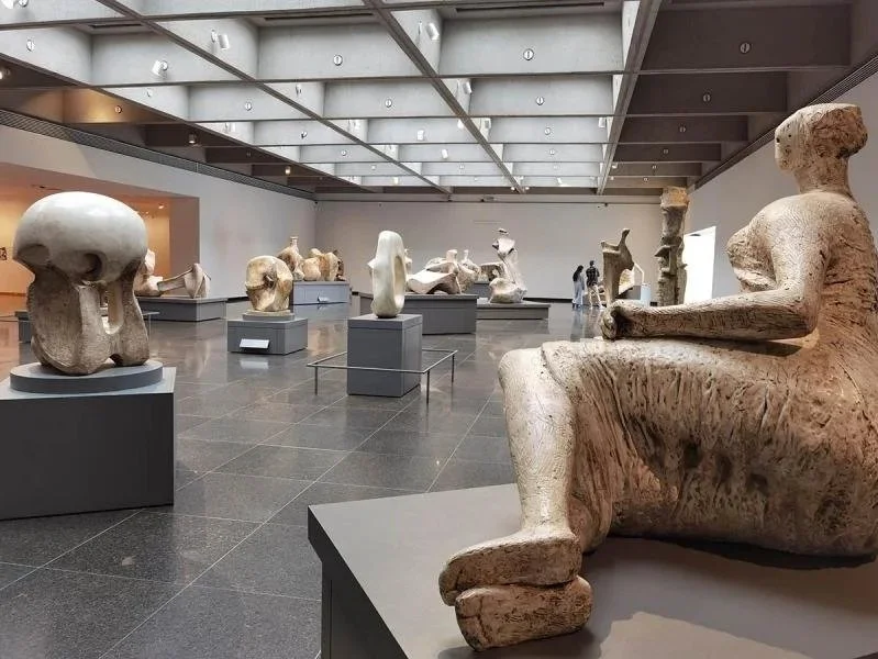 An array of large white sculptures from the Henry Moore Sculpture Centre.
