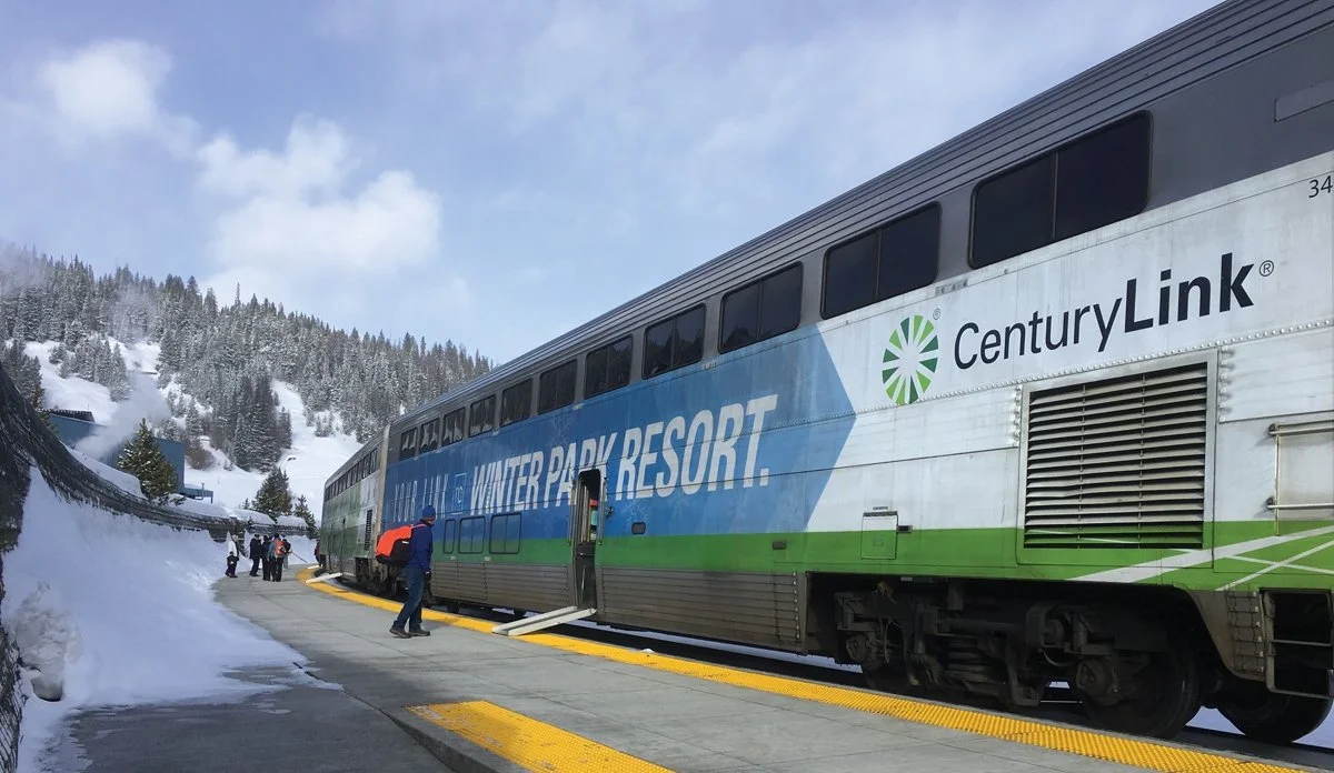 The Amtrak train to Winter Park in Colorado heads through the snowy mountains.