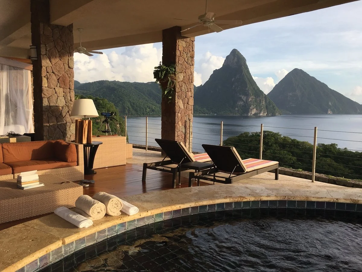 Mountains tower over the ocean from Jade Mountain Resort in Saint Lucia.