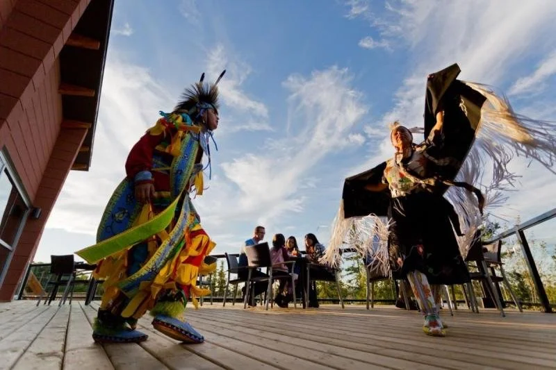 Two indigenous people dance at the Manitoulin Hotel and Conference Centre.