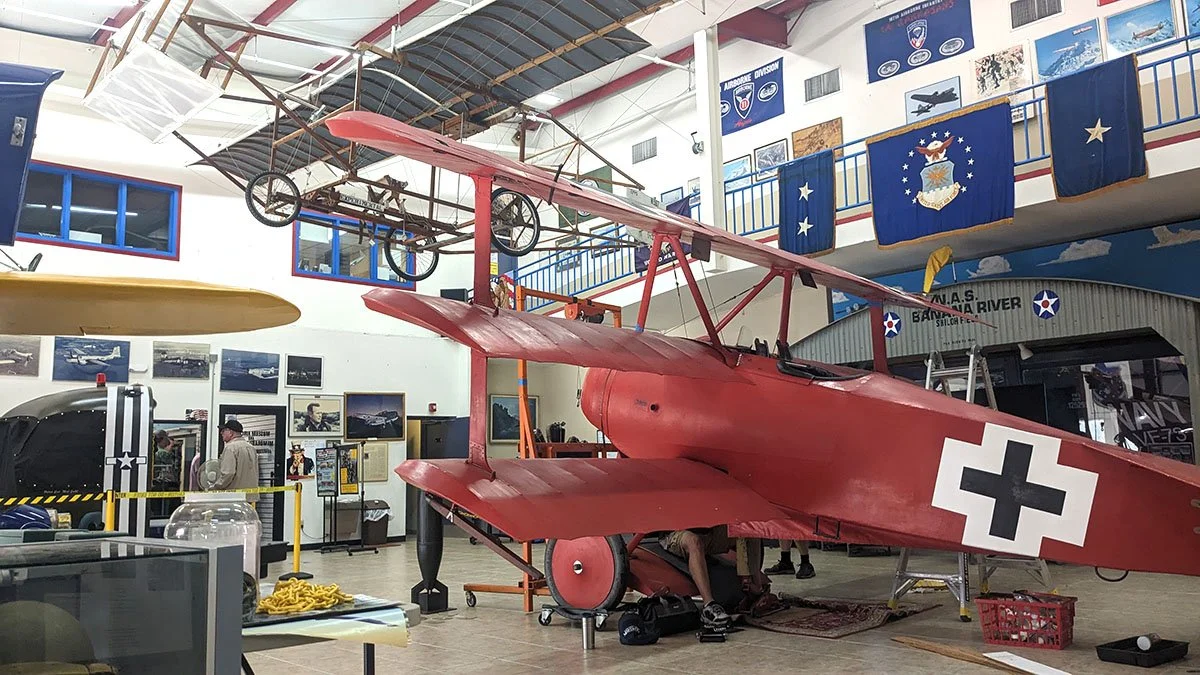 A replica of the Red Barron’s Fokker DR.1 Drei-Decker WWI biplane.