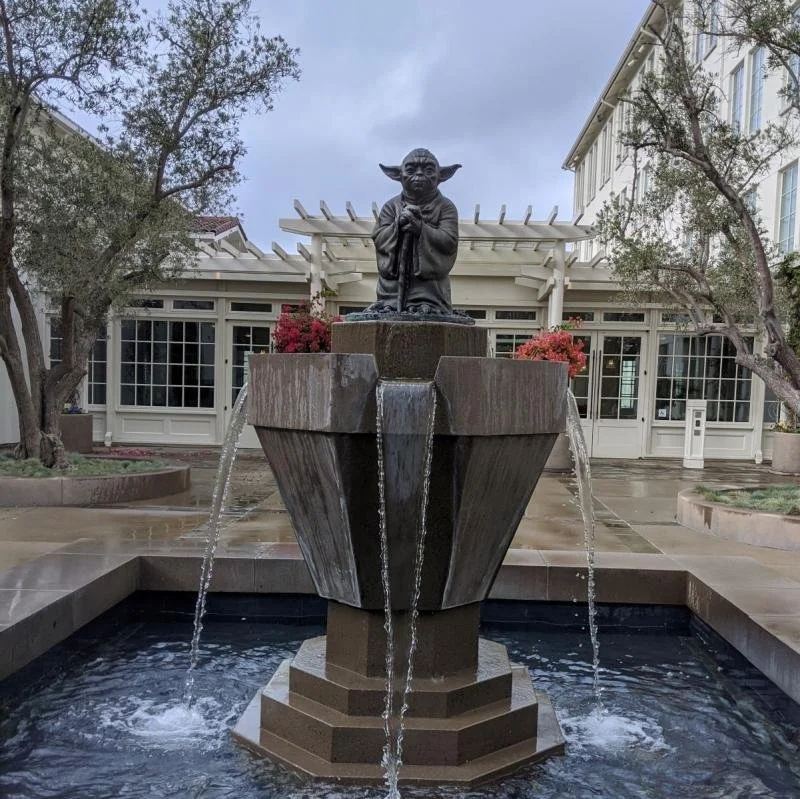 Yoda stands atop a fountain at the Industrial Light and Magic headquarters.