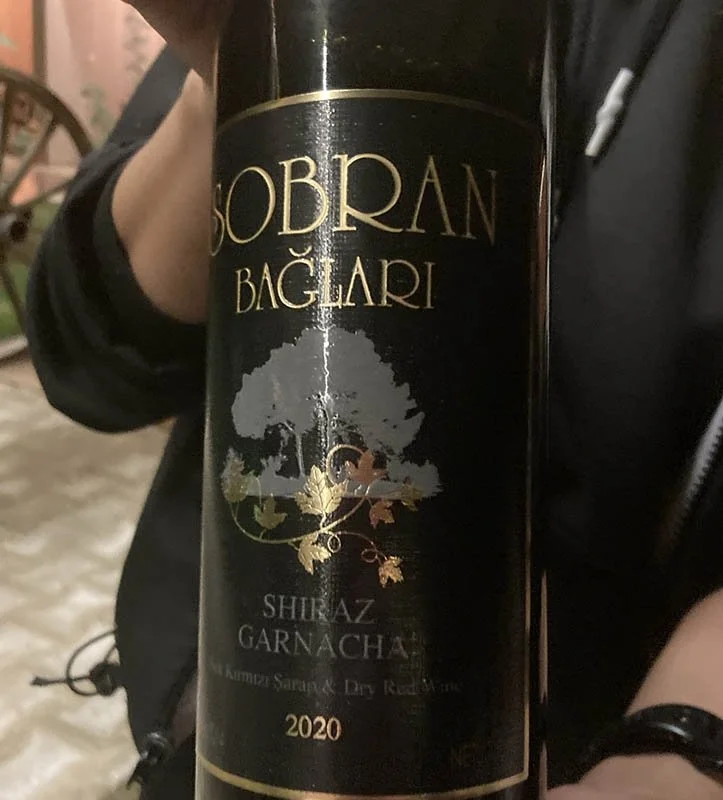 A large bottle of wine from Sobran Vineyards.