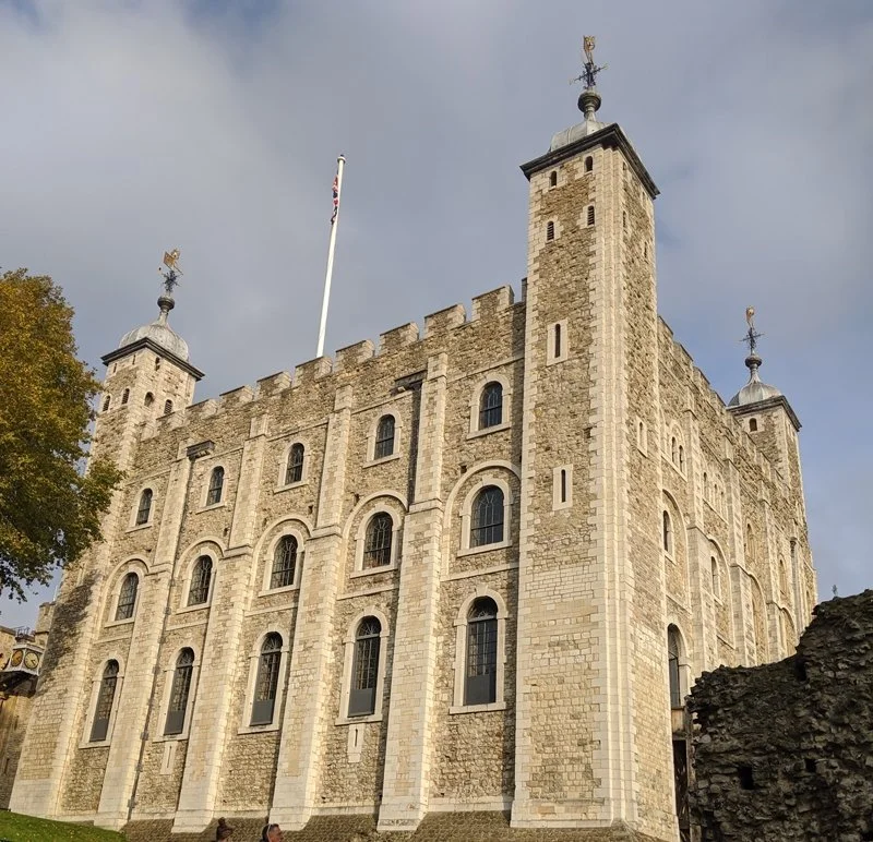 The tower of london pointing towards the sky.