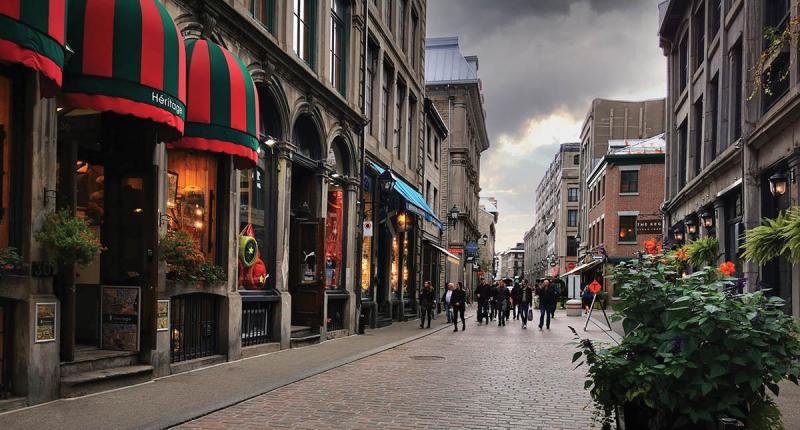 Dark clouds cover the streets of Rue St-Paul in Old Montreal.