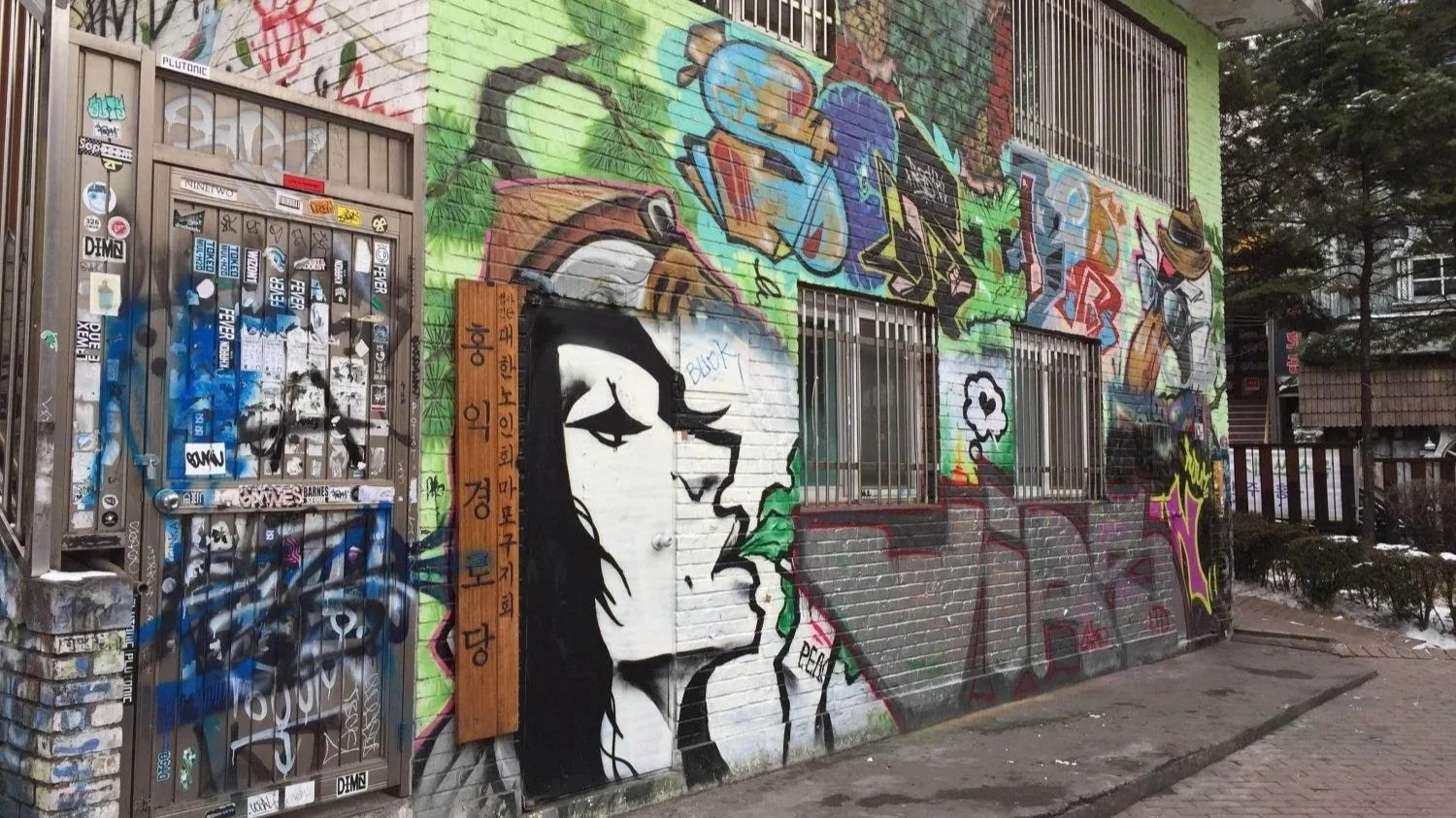 Bright graffiti lines the streets in Seoul.