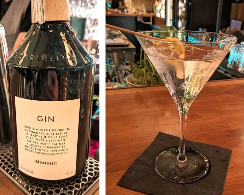 A big bottle of gin alongside a martini at Vallier Bistro.