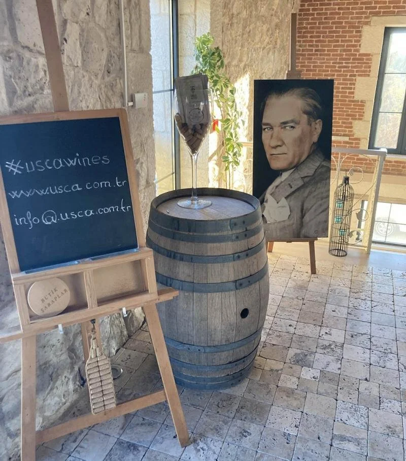 The entrance to USCA winery is adorned with a portrait of Kamal Attaturk