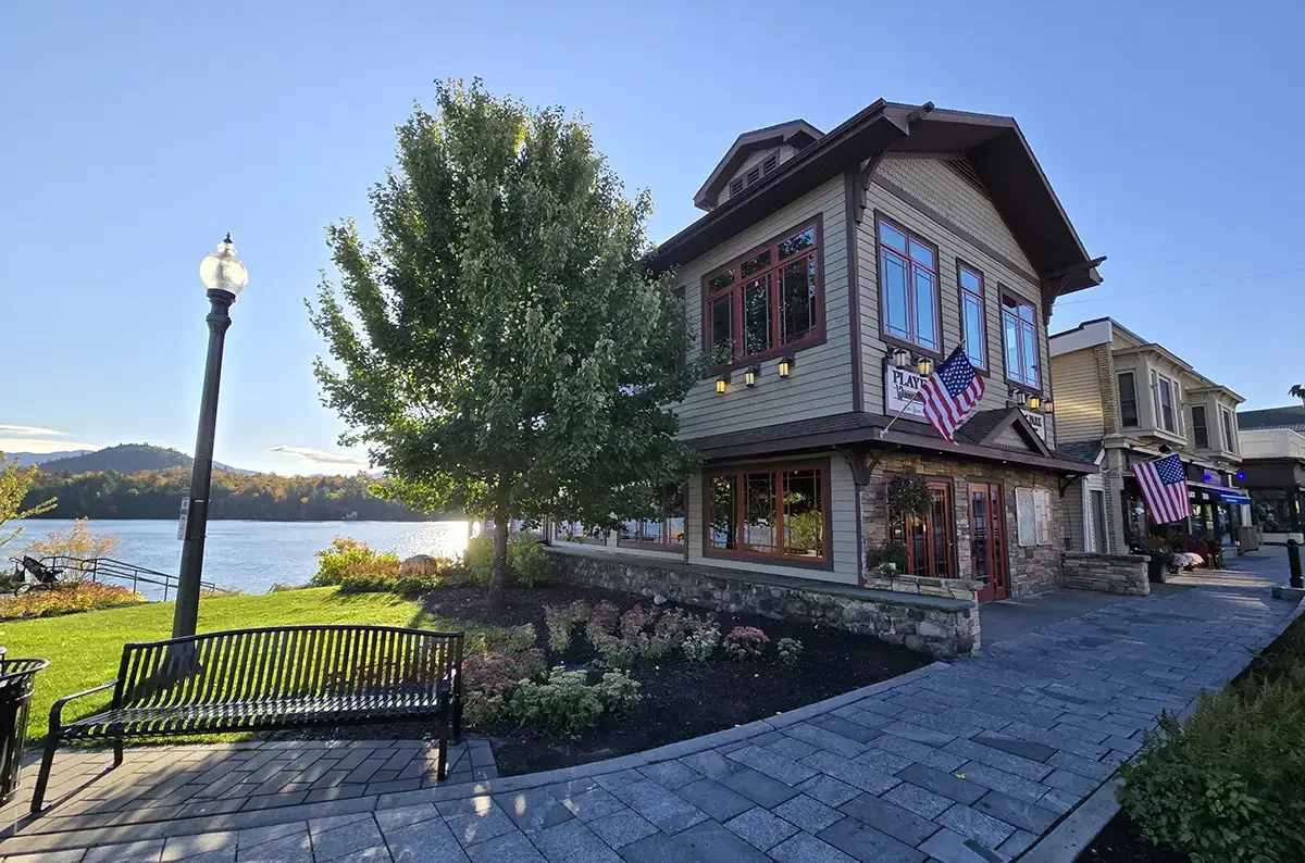 The quaint Main Street of Lake Placid, complete with a gorgeous view of Mirror Lake.