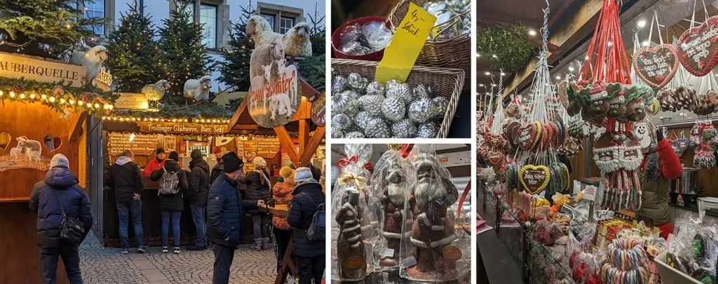 A wooden vendor hut at the Stuttgart Christmas Market adorned with rooftop sheep and Christmas trees.