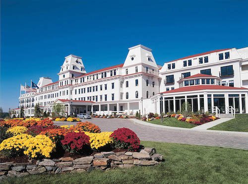 A white and red structure of the scenic Conway railroad.
