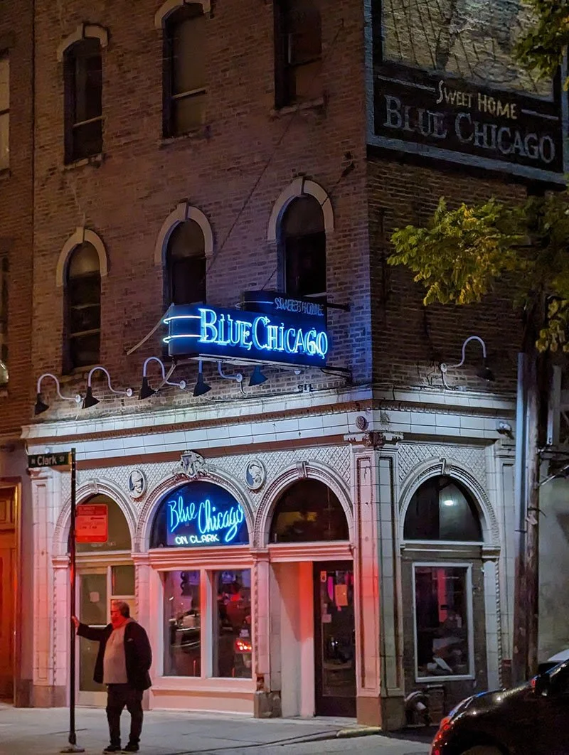 A man stands outside Sweet Home, Blue Chicago.